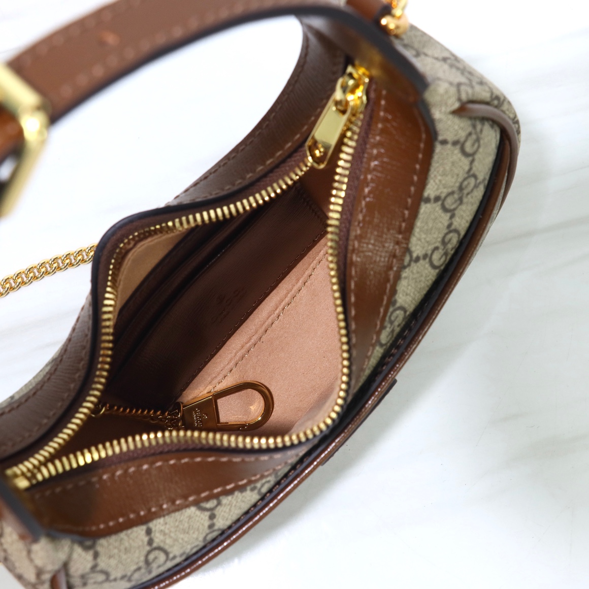 Bagsaaa Gvc*1 GG Half Moon Shaped Mini Bag in Beige and ebony GG Svp*me canvas - 22 x 12.5 x 5cm