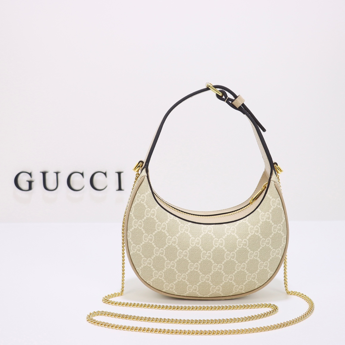 Bagsaaa Gvc*1 GG Half Moon Shaped Mini Bag in White and ebony GG Svp*me canvas - W22cm x H12.5cm x D5cm
