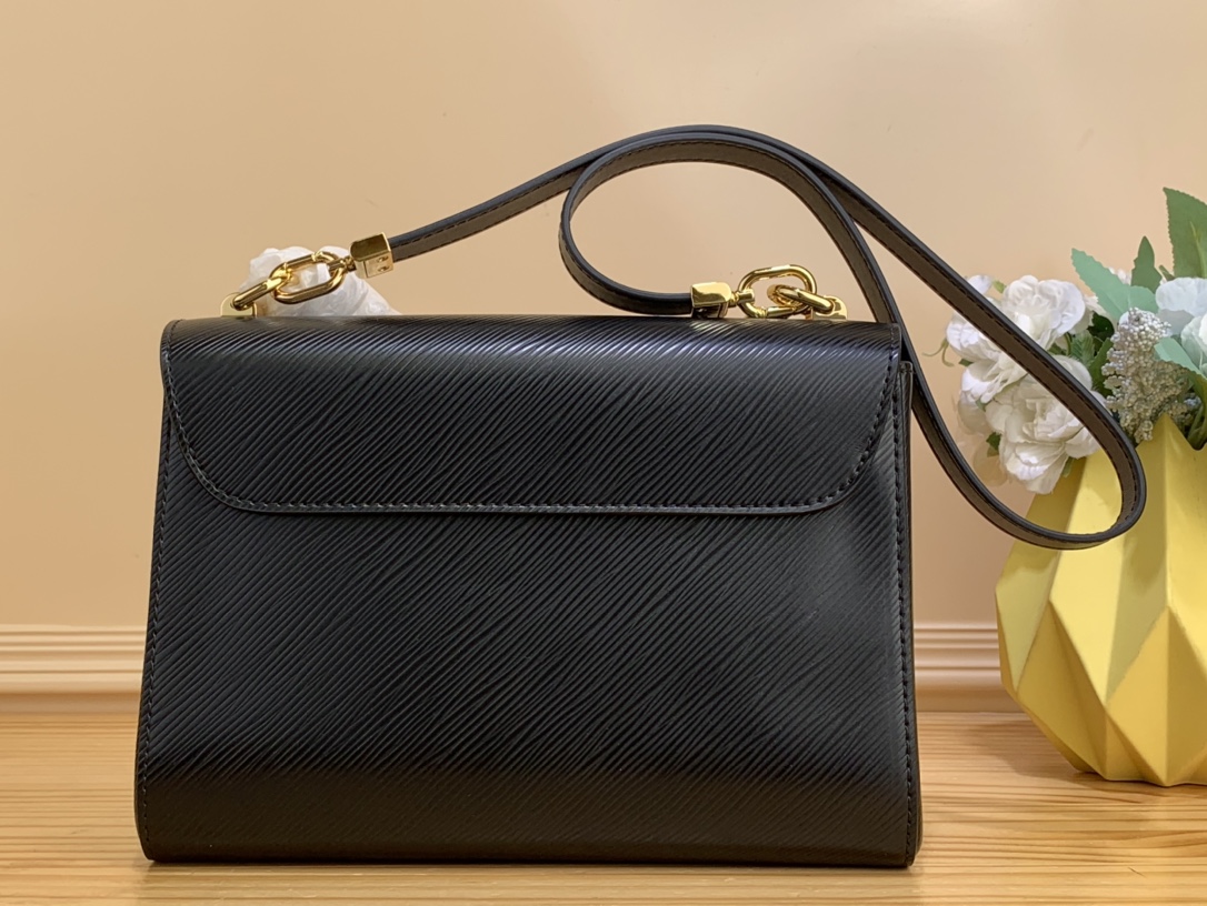 Bagsaaa L0vis Vvtt0n Twist MM in black epi wwith flower charm strap - 23 x 17 x 9.5 cm