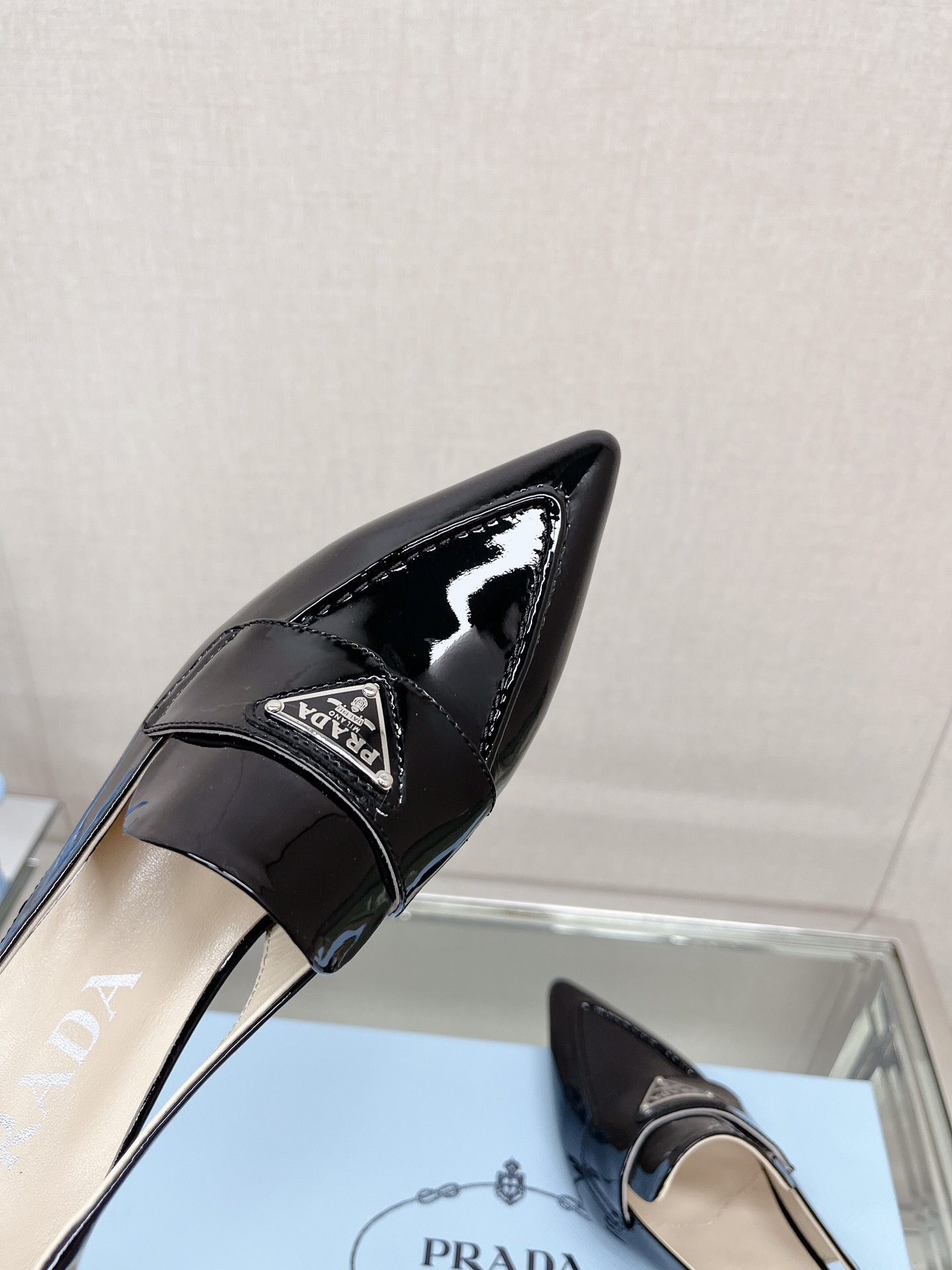 Bagsaaa Pra*a Patent black leather slingbacks (45 mm)