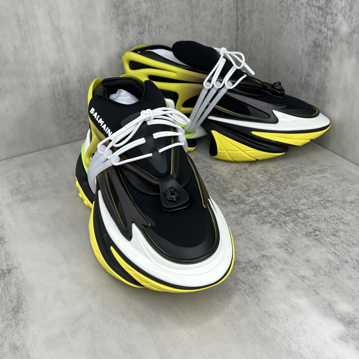 Bagsaaa Balmain Unicorn Low Top trainers in neoprene and leather yellow