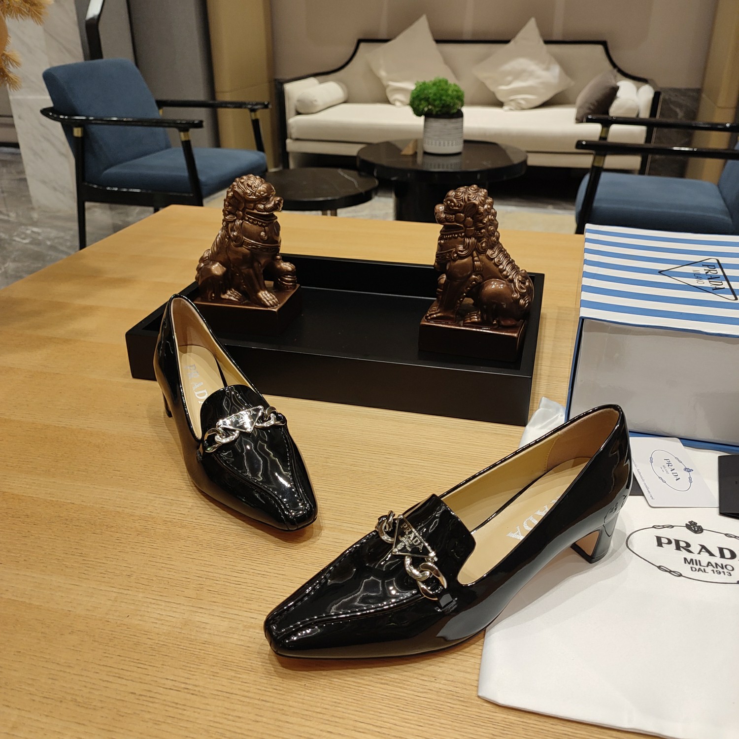 Bagsaaa Pra*a Embellished patent leather pumps