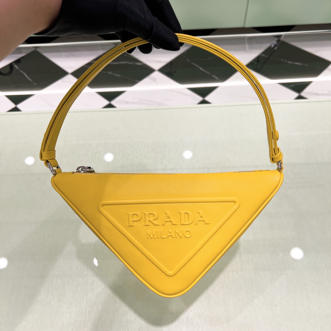 Bagsaaa Pra*a Triangle leather mini-bag yellow