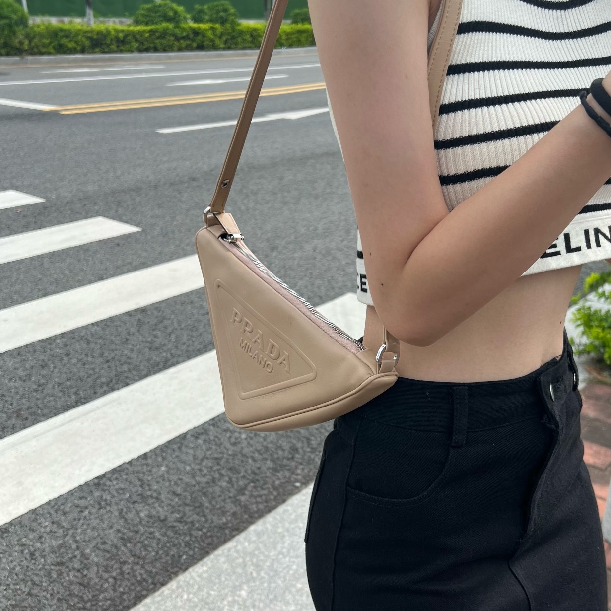 Bagsaaa Pra*a Triangle leather mini-bag beige