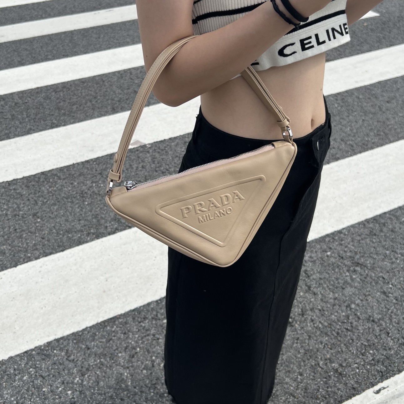 Bagsaaa Pra*a Triangle leather mini-bag beige