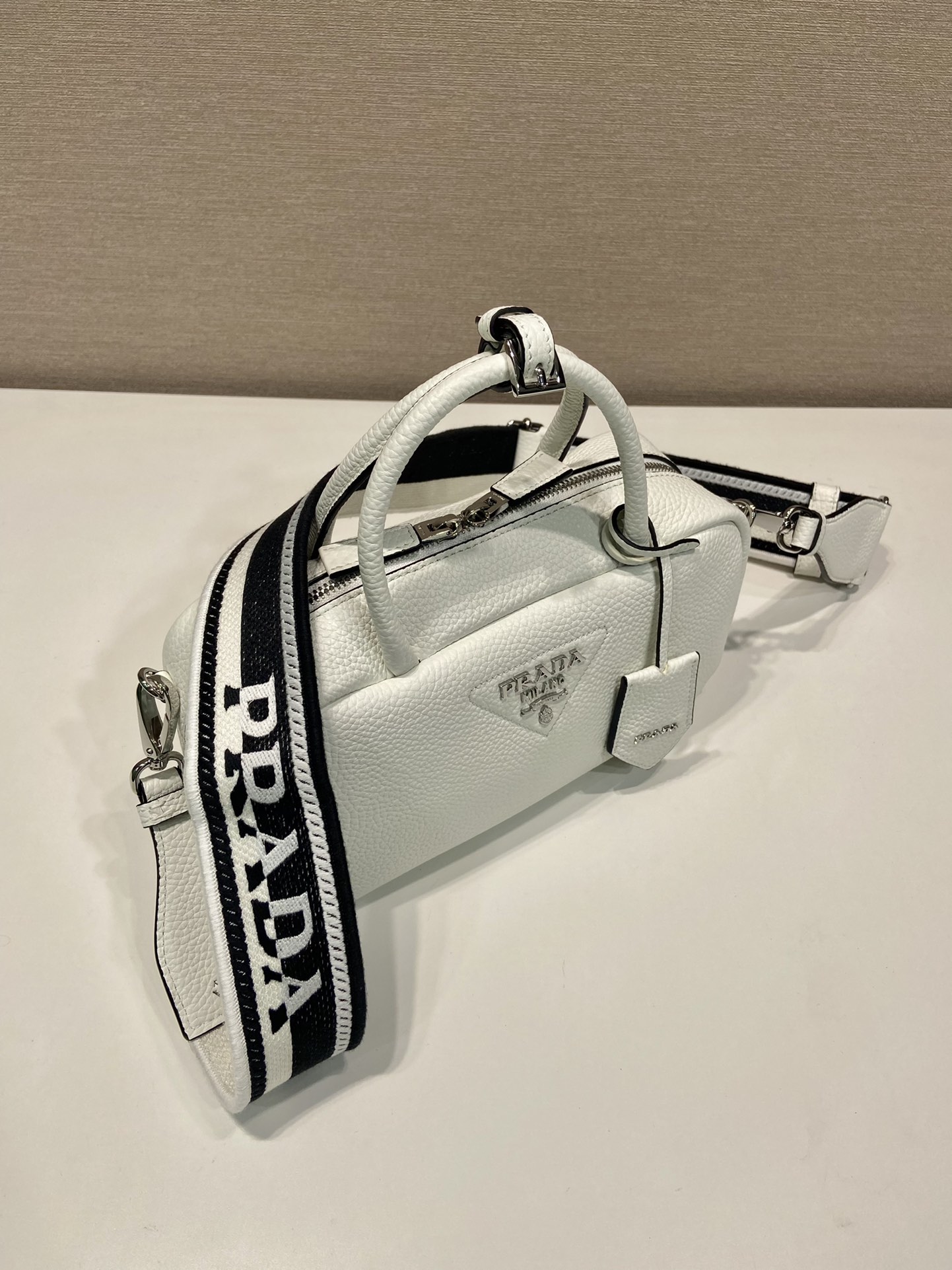Bagsaaa Pra*a Leather top-handle bag white - 24x12x8cm