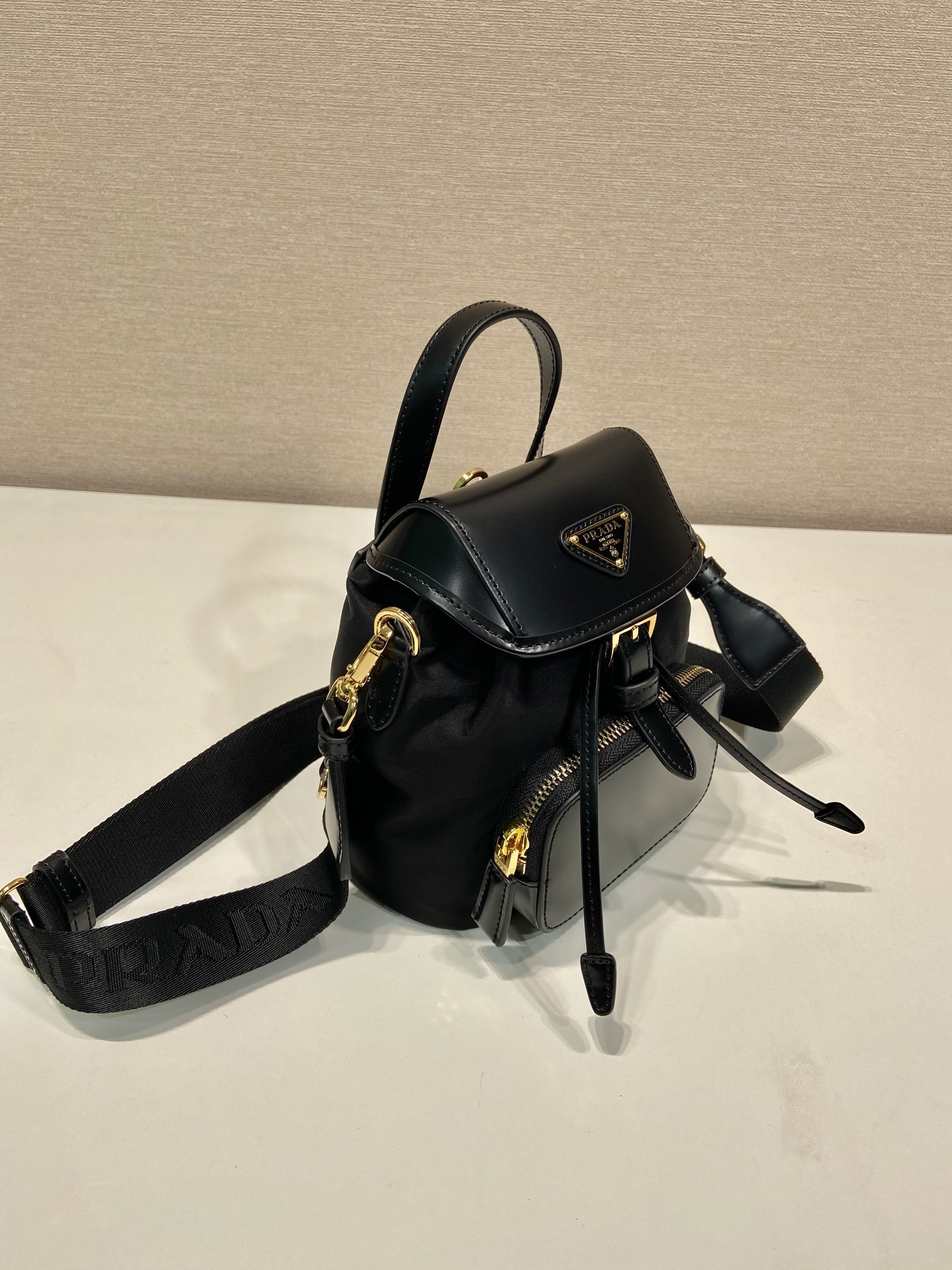 Bagsaaa Pra*a Small Re-Nylon and brushed leather backpack