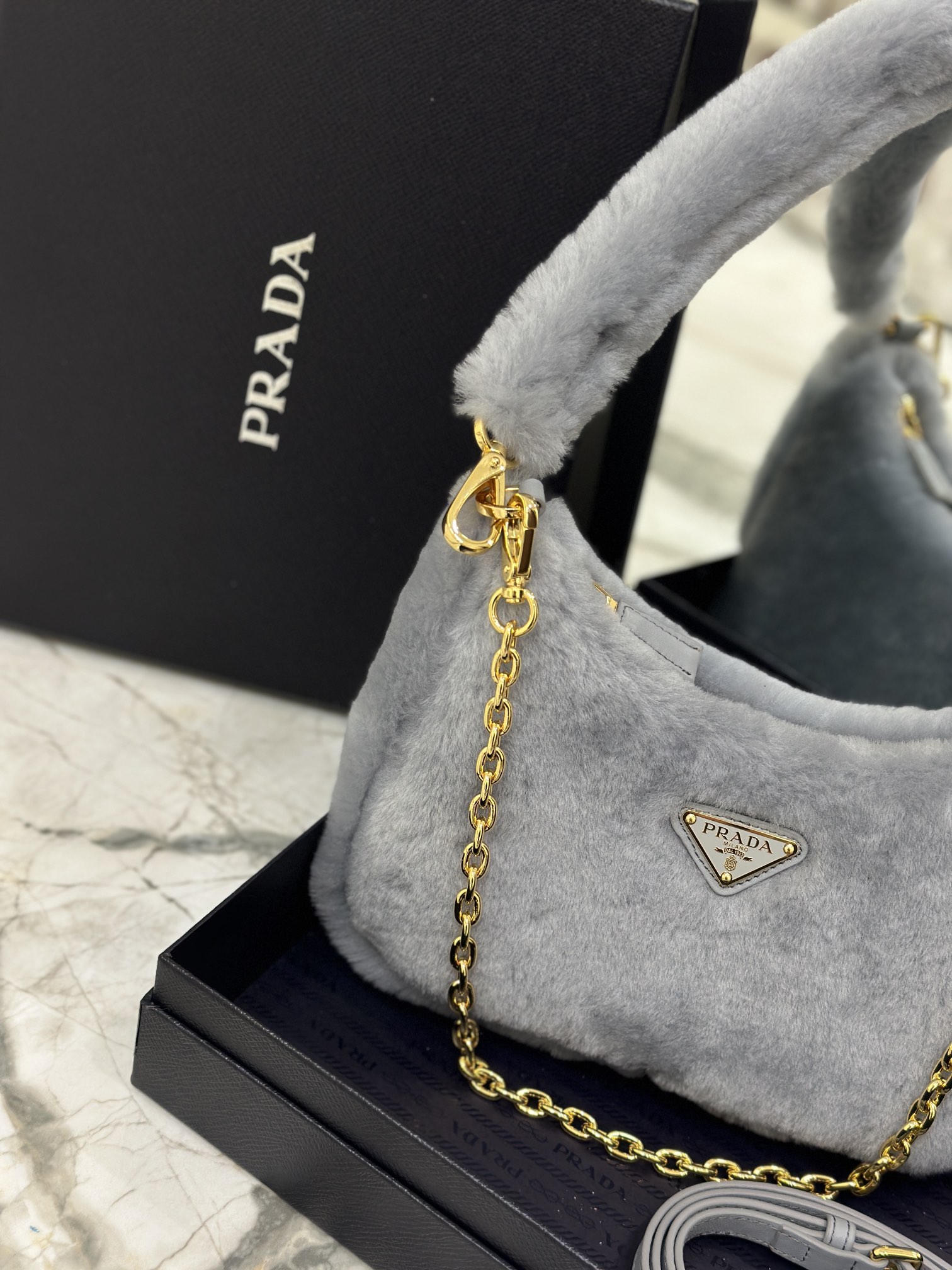 Bagsaaa Pra*a Re-Edition 2005 shearling shoulder bag grey 22x18x6cm