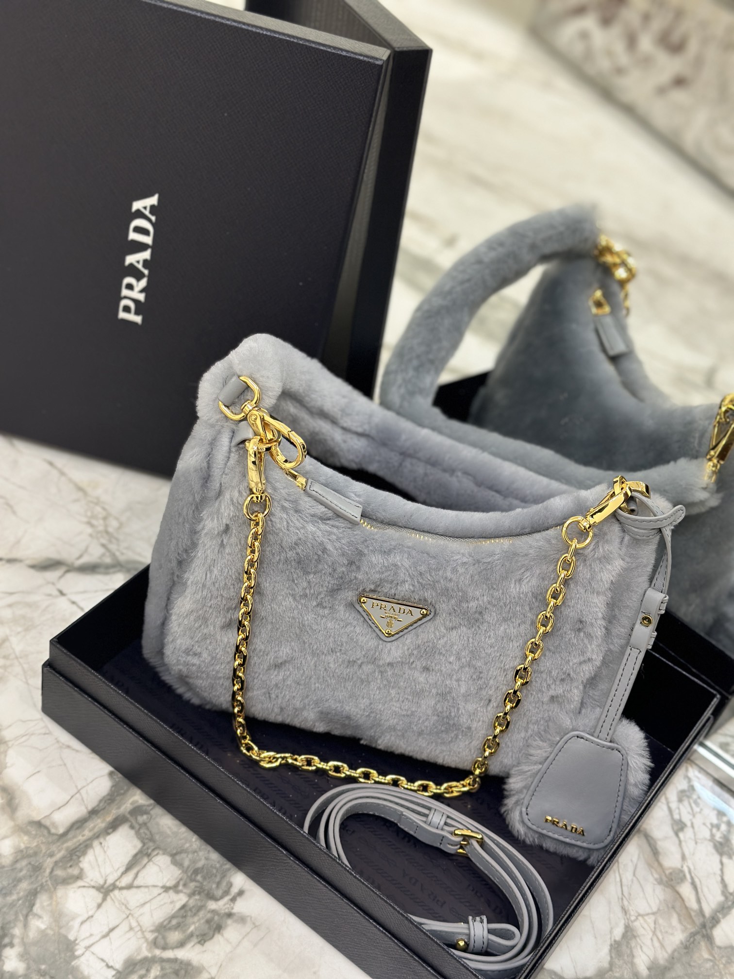 Bagsaaa Pra*a Re-Edition 2005 shearling shoulder bag grey 22x18x6cm
