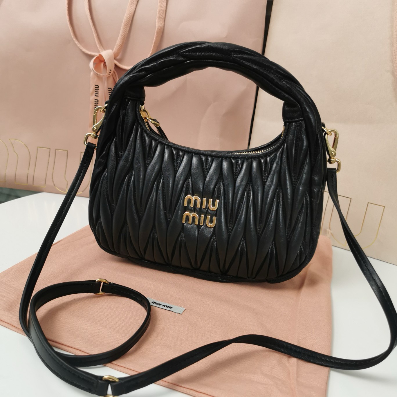 Bagsaaa M1um1u Wander matelassé nappa leather hobo bag