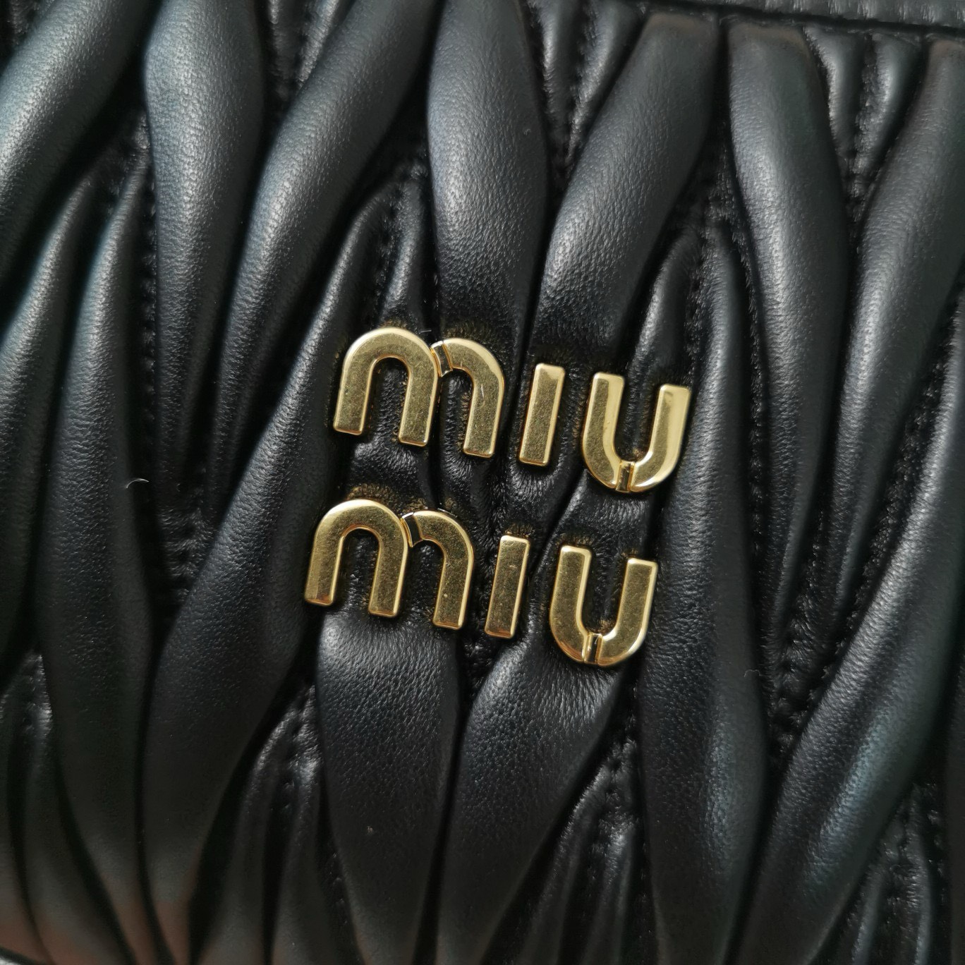 Bagsaaa M1um1u Wander matelassé nappa leather hobo bag