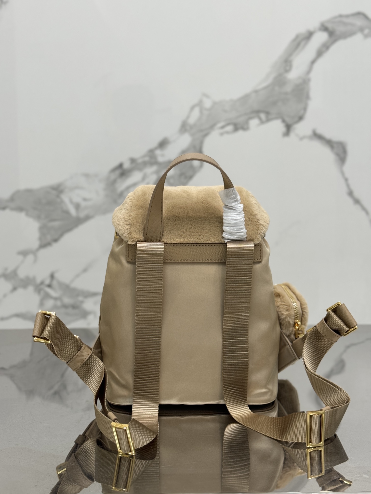 Bagsaaa Pra*a Re-Nylon and shearling backpack in beige - 25x20.5x11.5cm