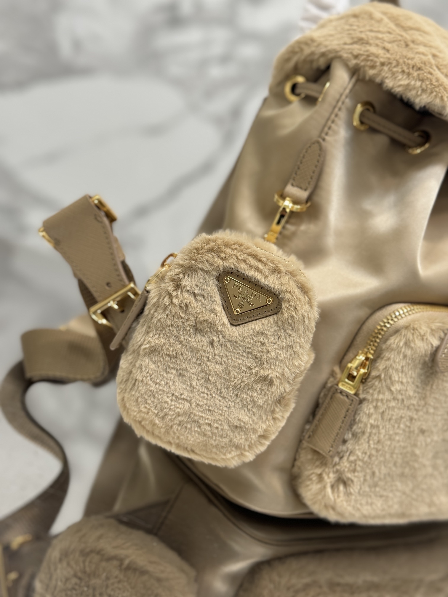 Bagsaaa Pra*a Re-Nylon and shearling backpack in beige - 25x20.5x11.5cm