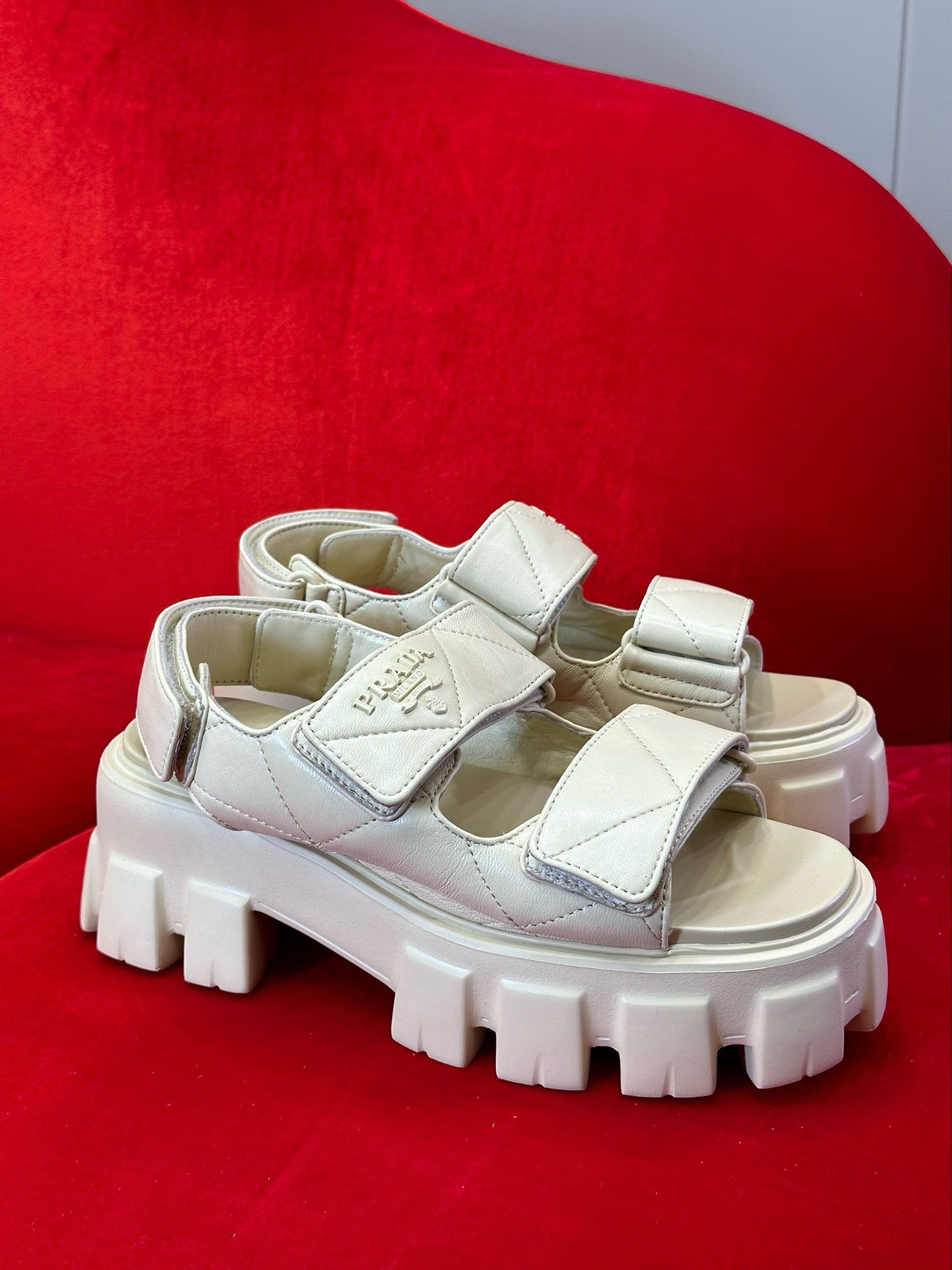 Bagsaaa Pra*a Triangle-Logo Quilted Sandals Beige