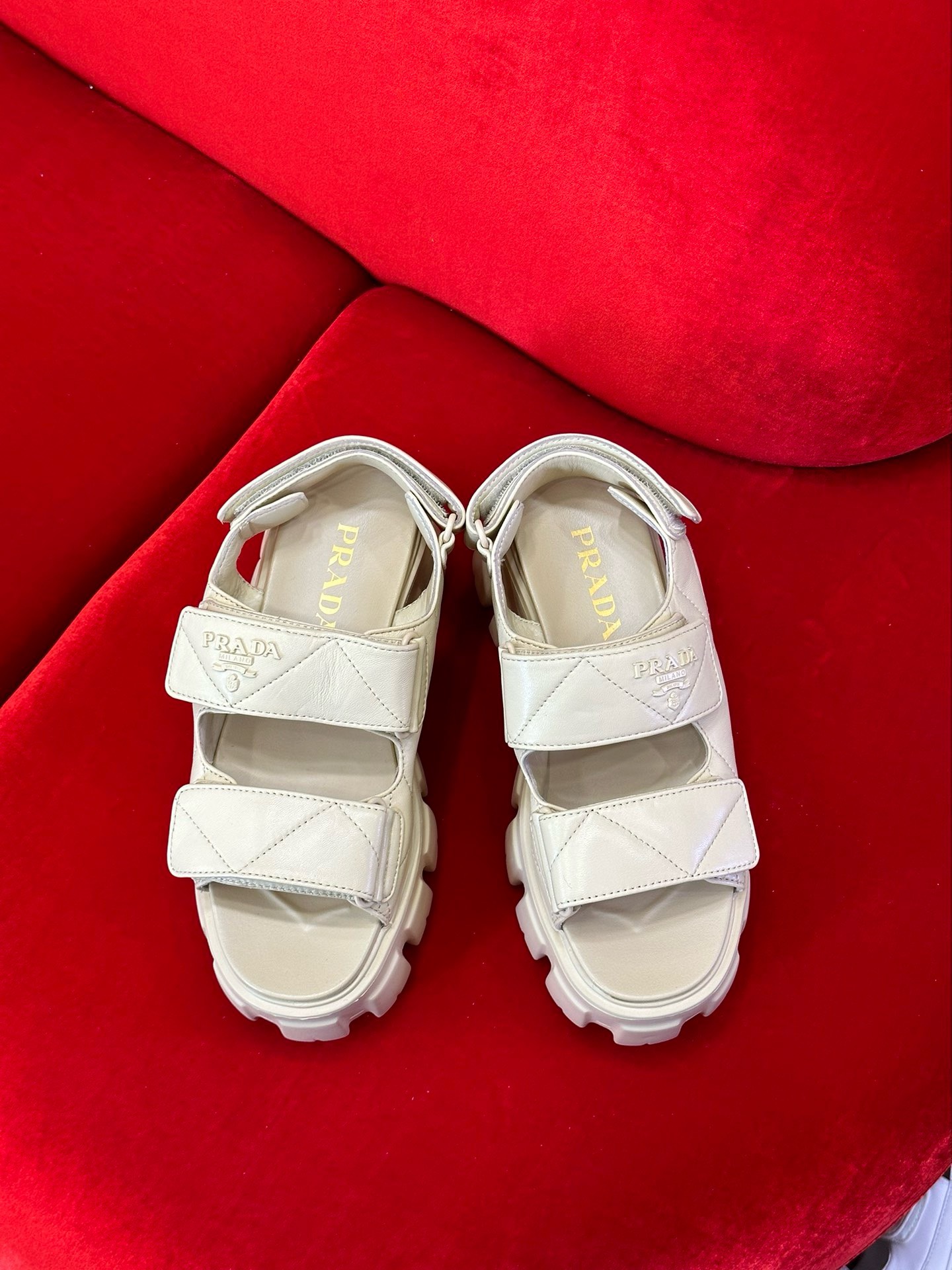 Bagsaaa Pra*a Triangle-Logo Quilted Sandals Beige
