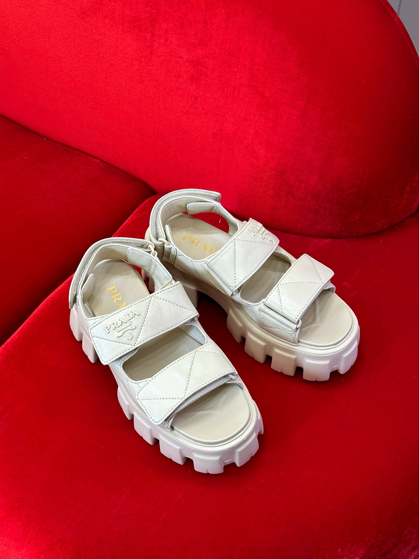 Bagsaaa Pra*a Triangle-Logo Quilted Sandals Beige