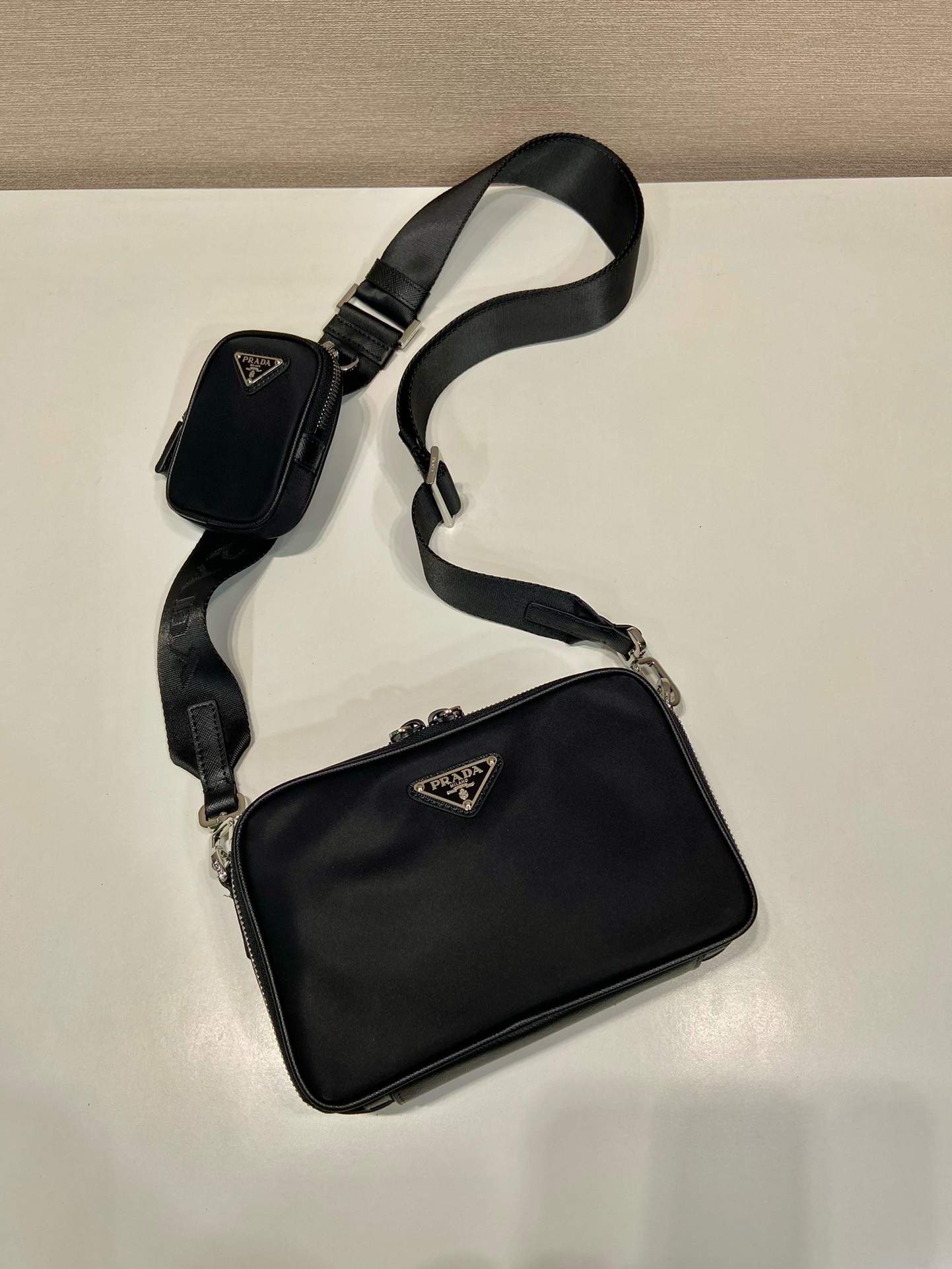 Bagsaaa Pra*a Brique leather and recycled-nylon shoulder bag - 19x12x5cm