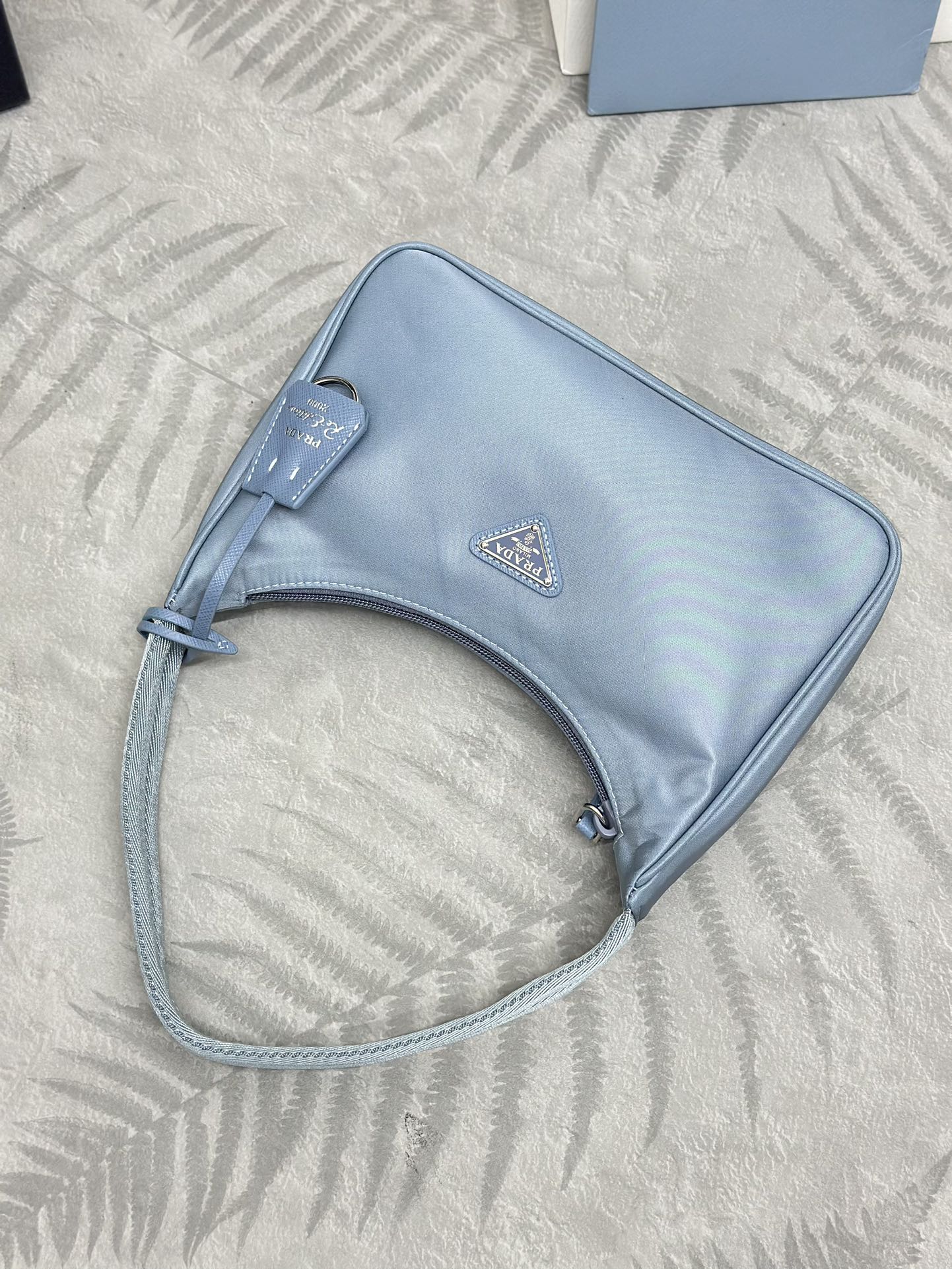 Bagsaaa Re-Nylon Pra*a Re-Edition 2000 mini-bag light blue - 22x6x17 cm