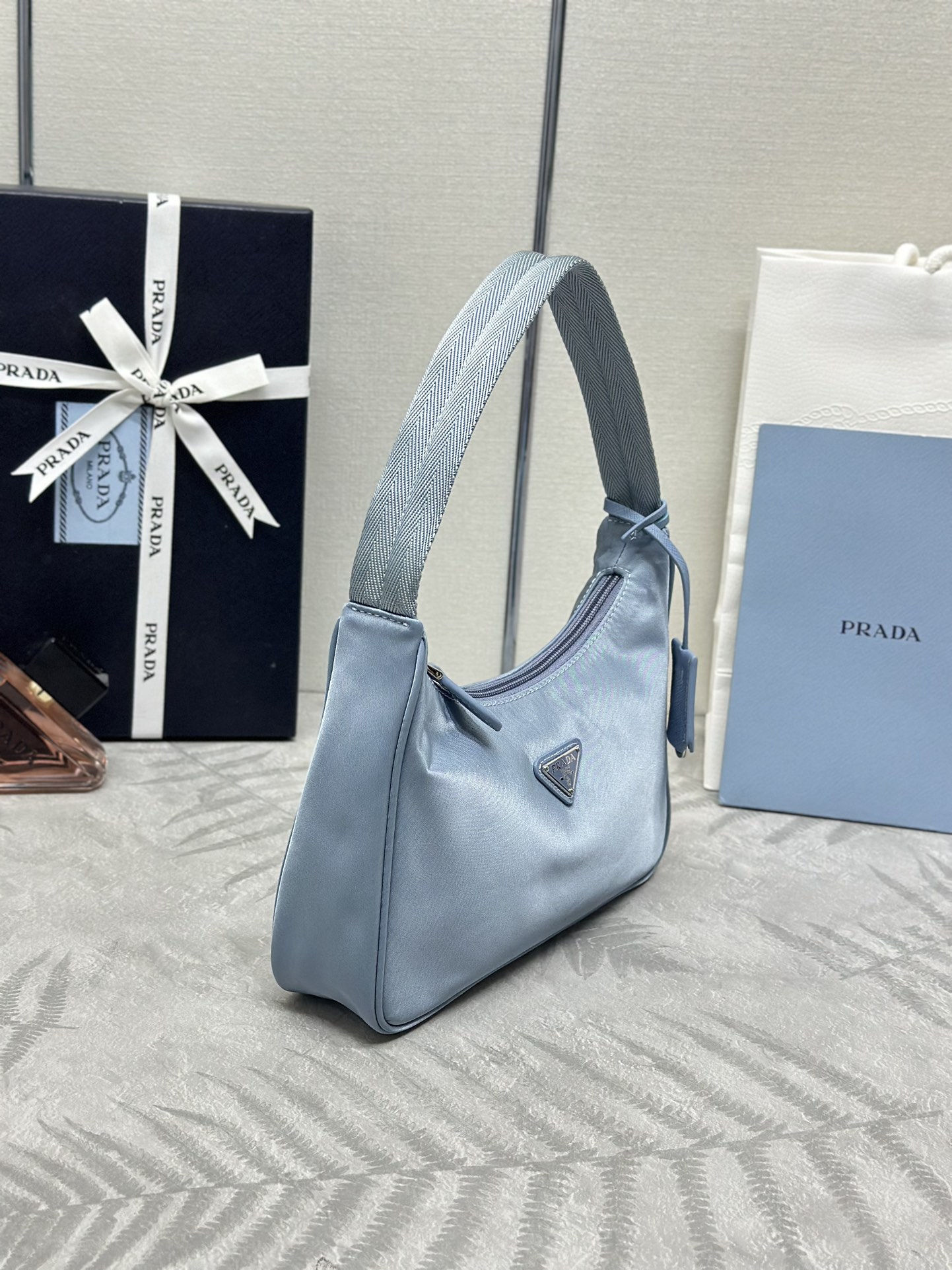Bagsaaa Re-Nylon Pra*a Re-Edition 2000 mini-bag light blue - 22x6x17 cm