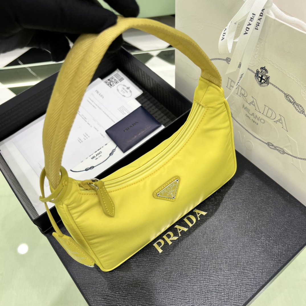 Bagsaaa Re-Nylon Pra*a Re-Edition 2000 mini-bag yellow - 22x6x17 cm