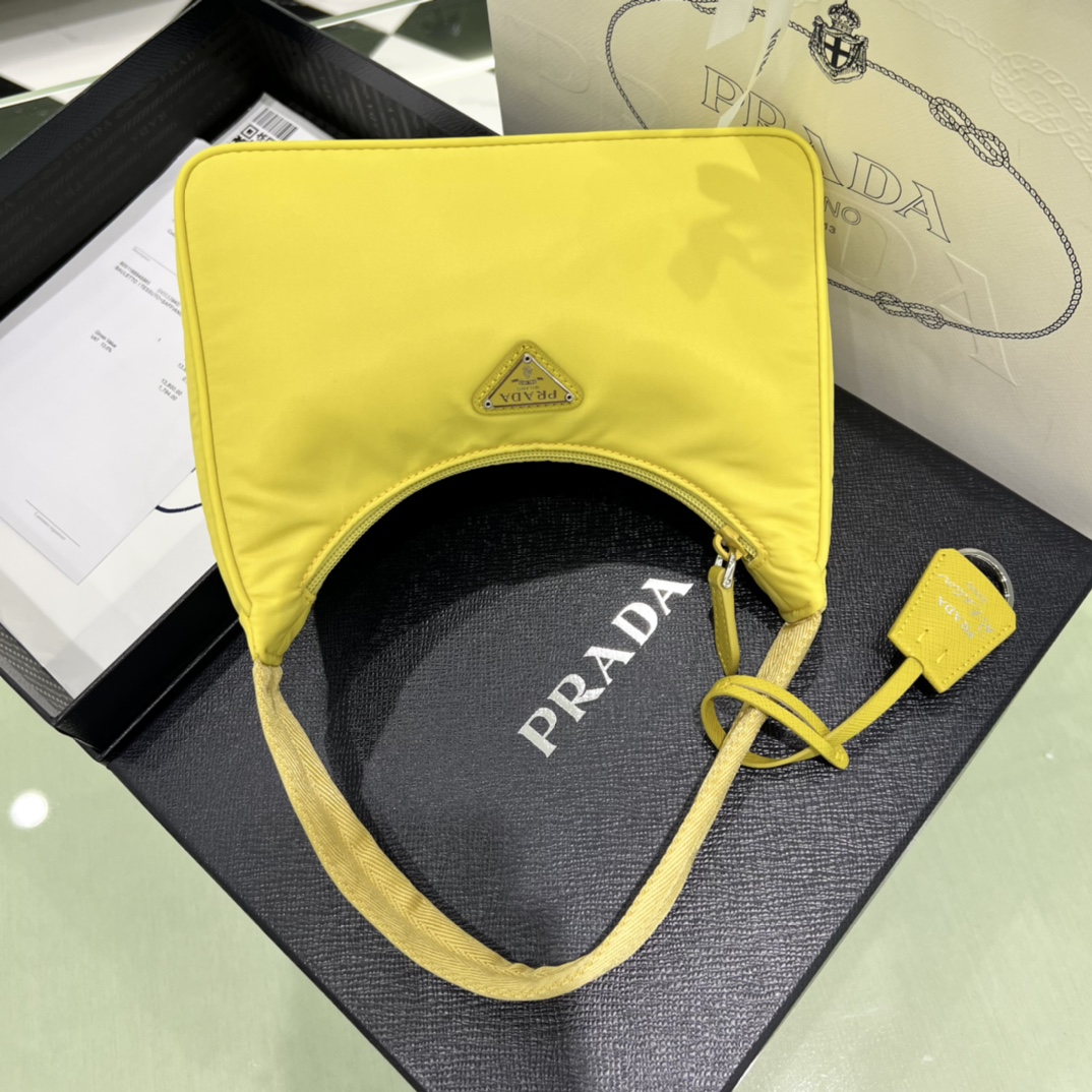 Bagsaaa Re-Nylon Pra*a Re-Edition 2000 mini-bag yellow - 22x6x17 cm