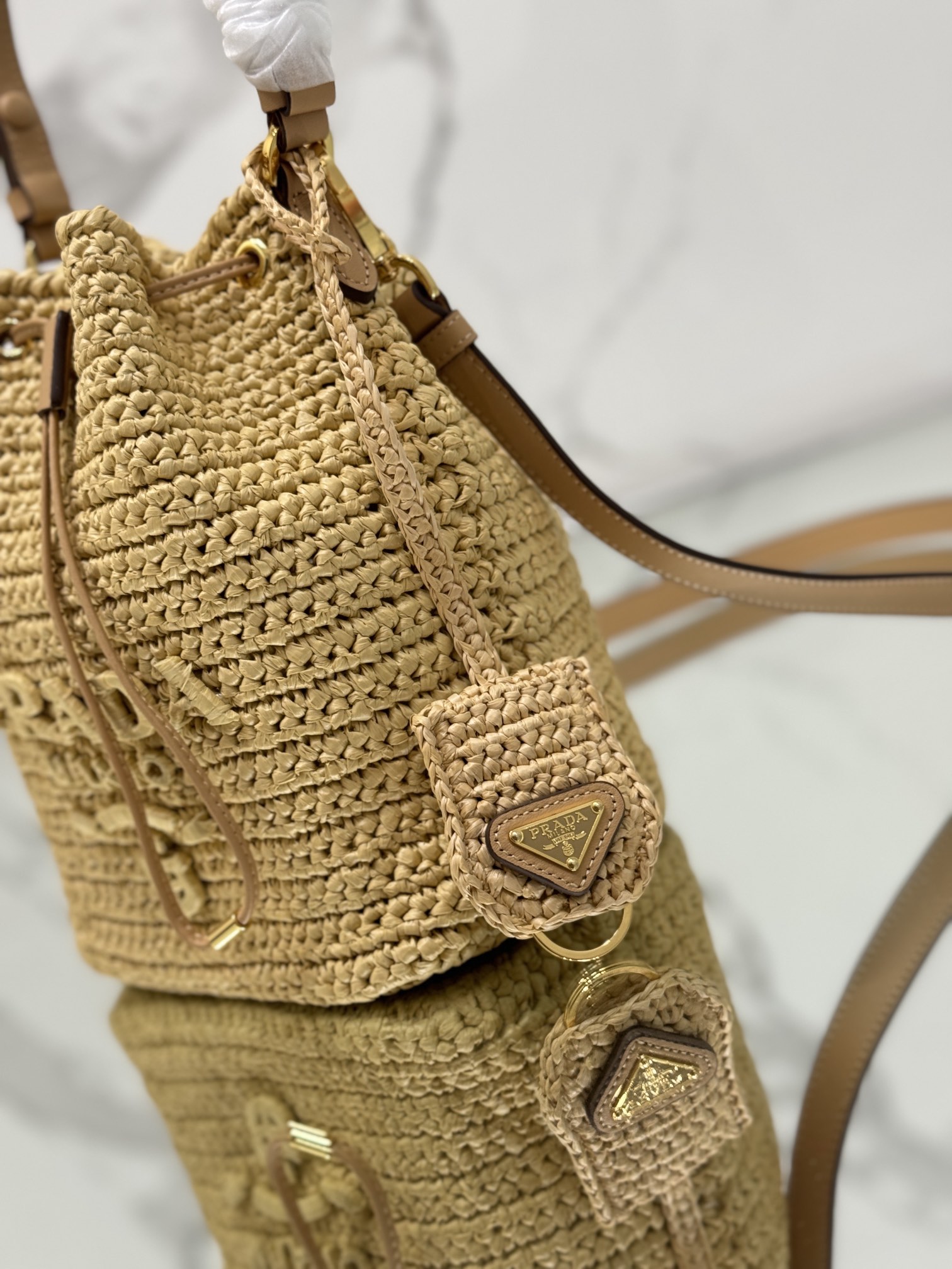 Bagsaaa Pra*a Crochet and leather mini-bucket bag - 19.5x15.5x10 cm