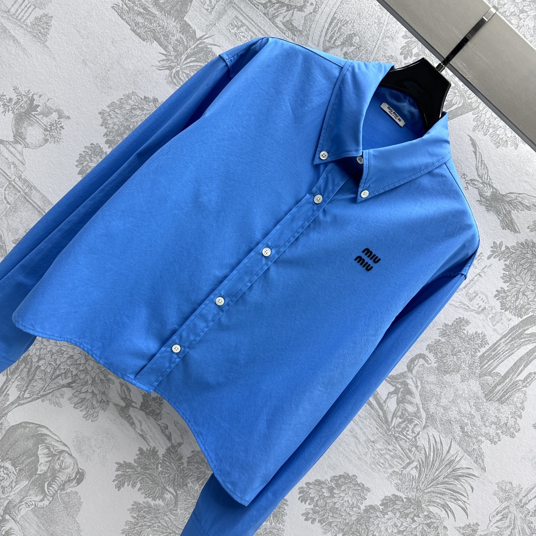 Bagsaaa M1um1u logo-embroidered cotton shirt Sapphire blue