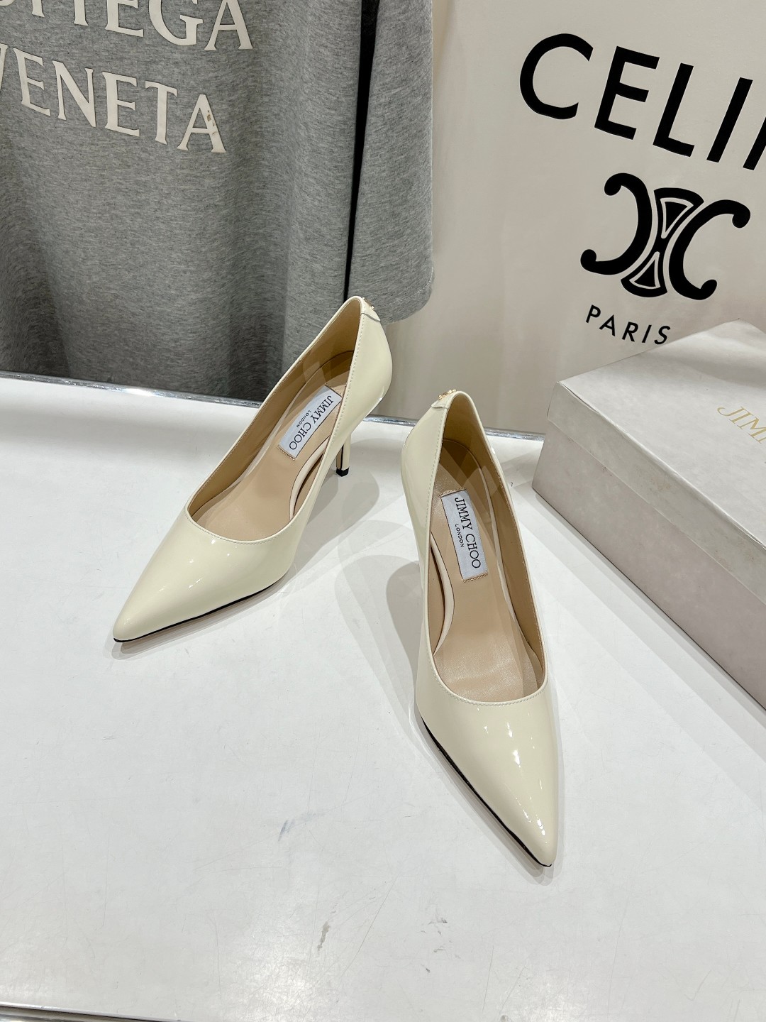 Bagsaaa J1m*y Ch00 Love 85 Latte Patent Leather Pumps with JC Emblem