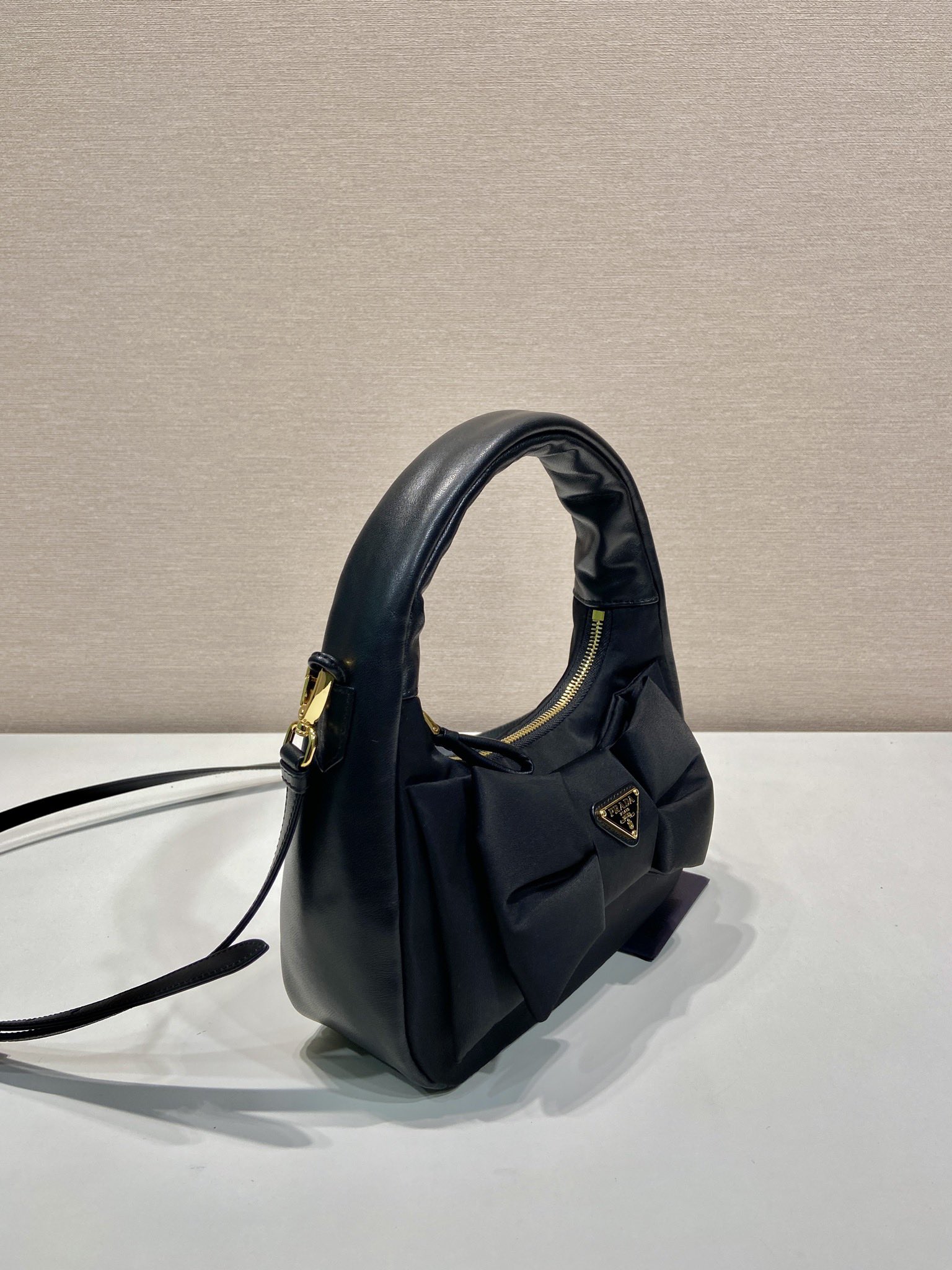 Bagsaaa Pra*a Re-Nylon and nappa leather mini-bag with bow 1BC241 black - 22cm