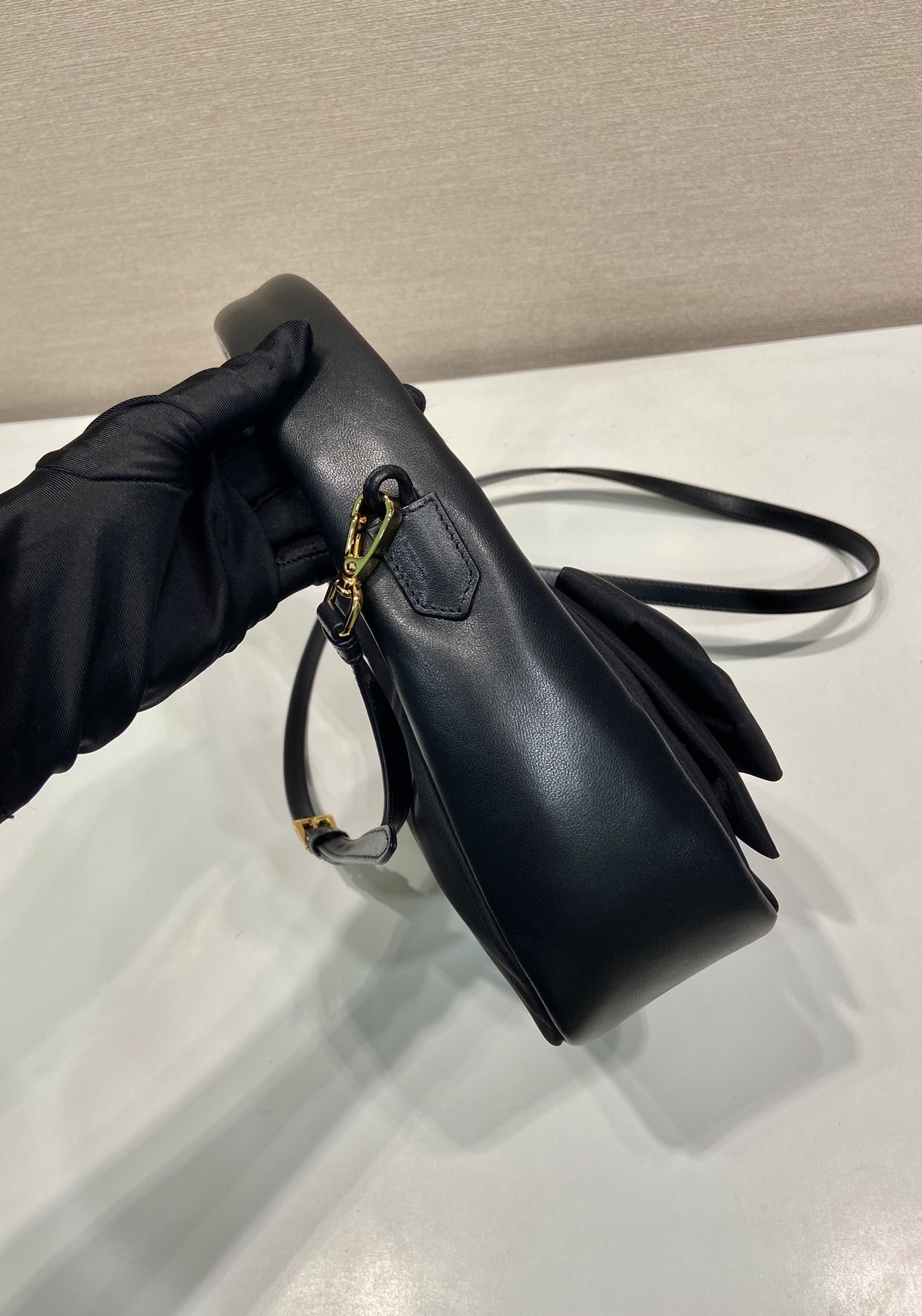 Bagsaaa Pra*a Re-Nylon and nappa leather mini-bag with bow 1BC241 black - 22cm