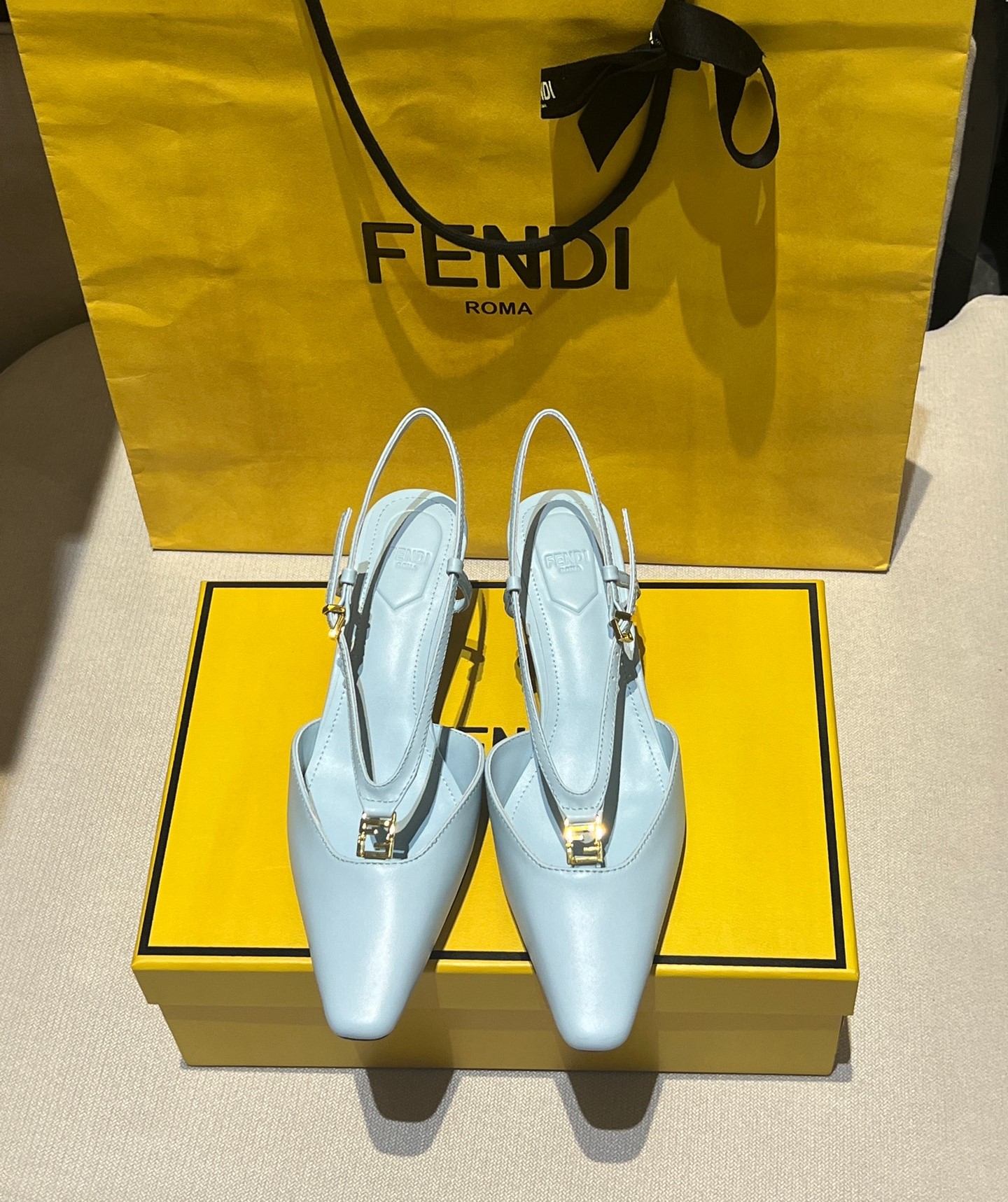 Bagsaaa F**di FFold Light blue leather low-heeled slingbacks
