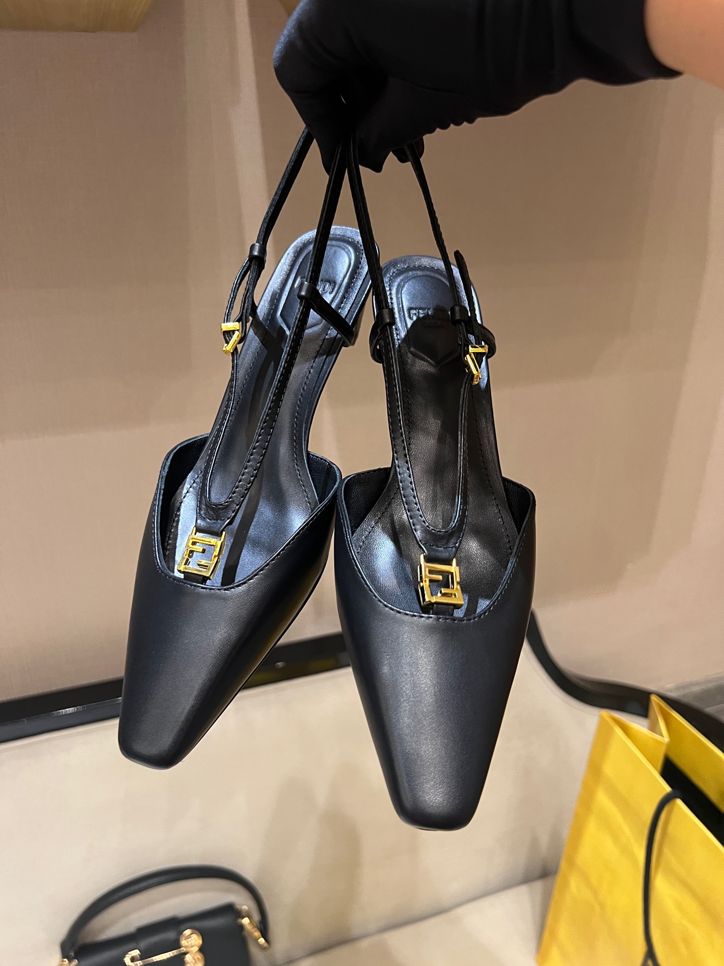 Bagsaaa F**di FFold black leather low-heeled slingbacks