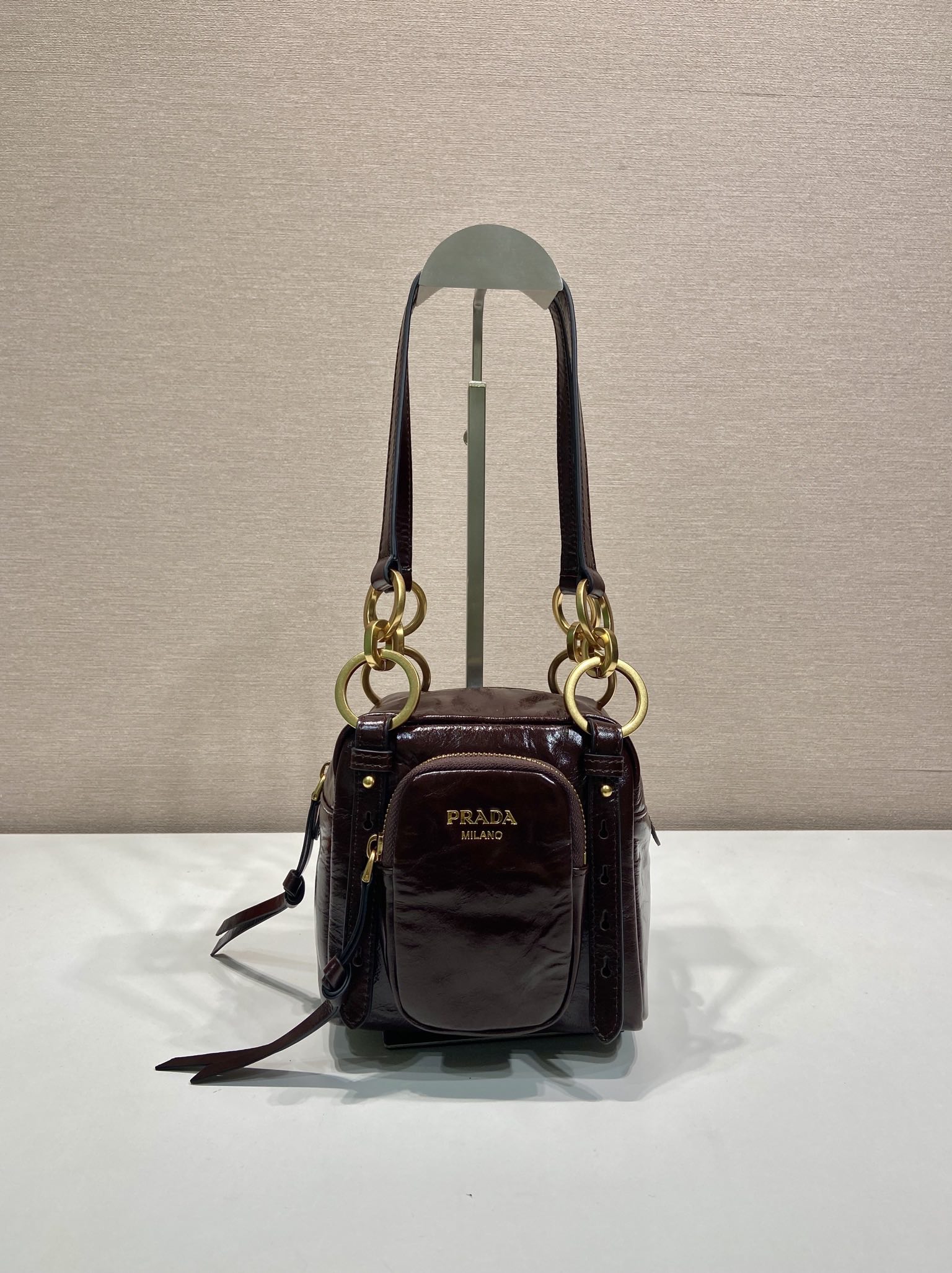 Bagsaaa Pra*a Dangle leather top-handle mini-bag 1BB137 dark brown - 14.5cm