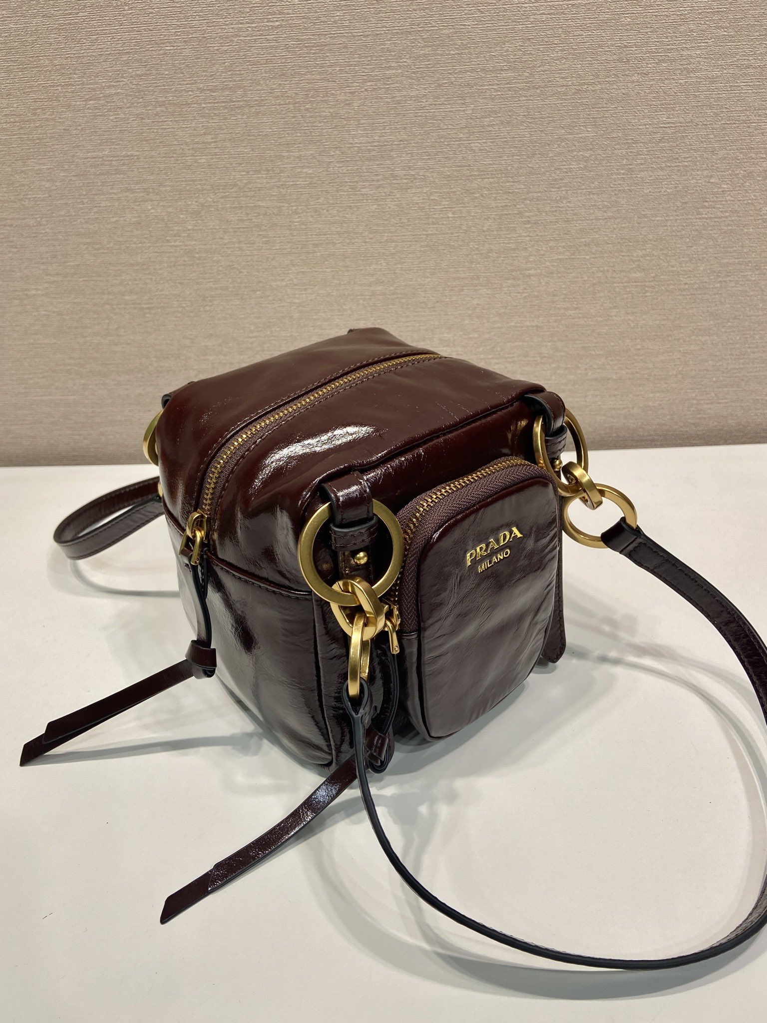 Bagsaaa Pra*a Dangle leather top-handle mini-bag 1BB137 dark brown - 14.5cm