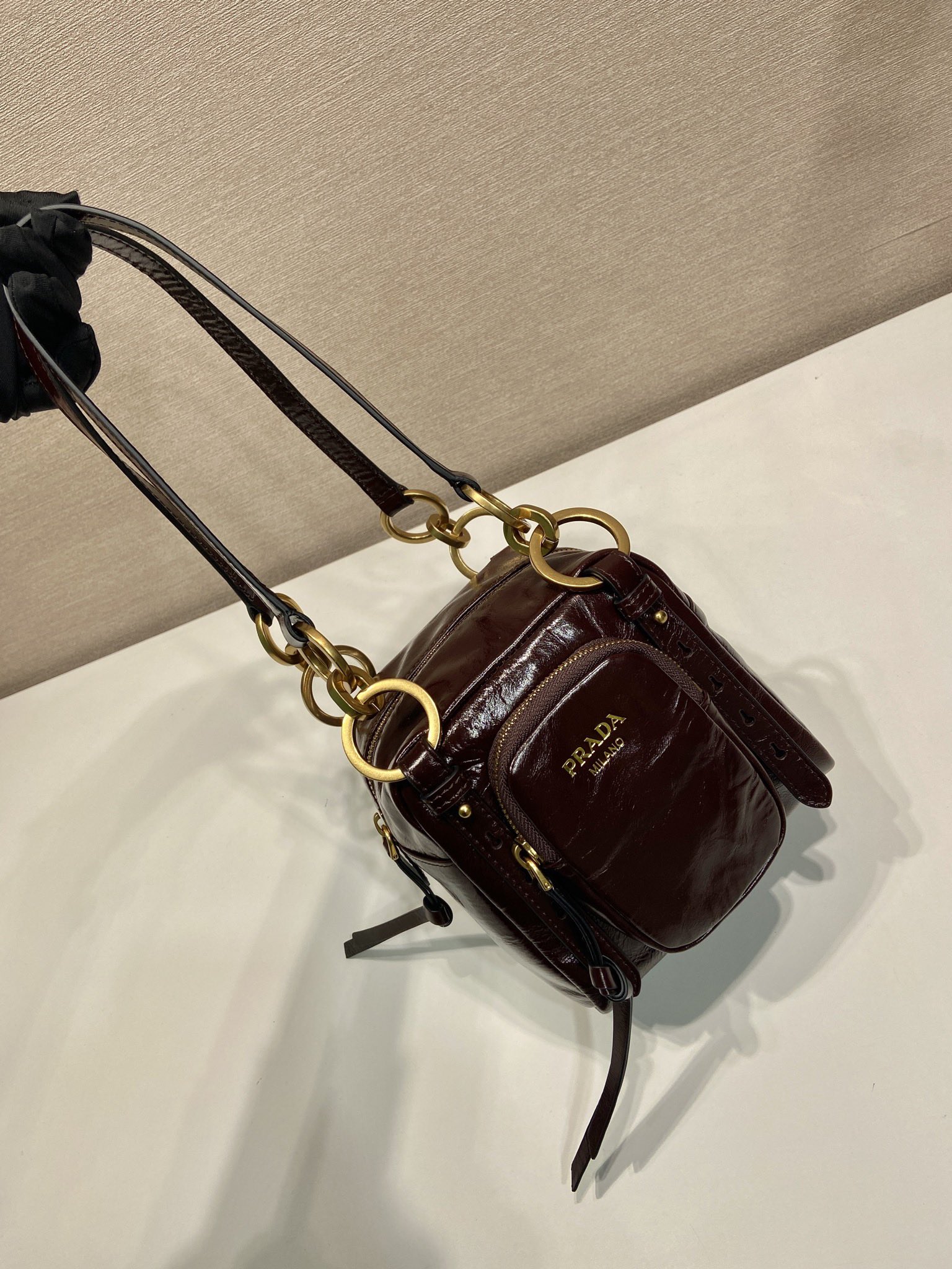 Bagsaaa Pra*a Dangle leather top-handle mini-bag 1BB137 dark brown - 14.5cm