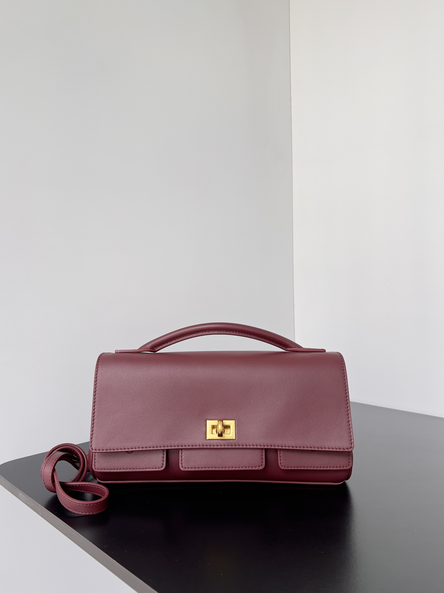 Bagsaaa Ba1en*iaga Bel Air Small Clutch On Strap in red & gold - 27cm