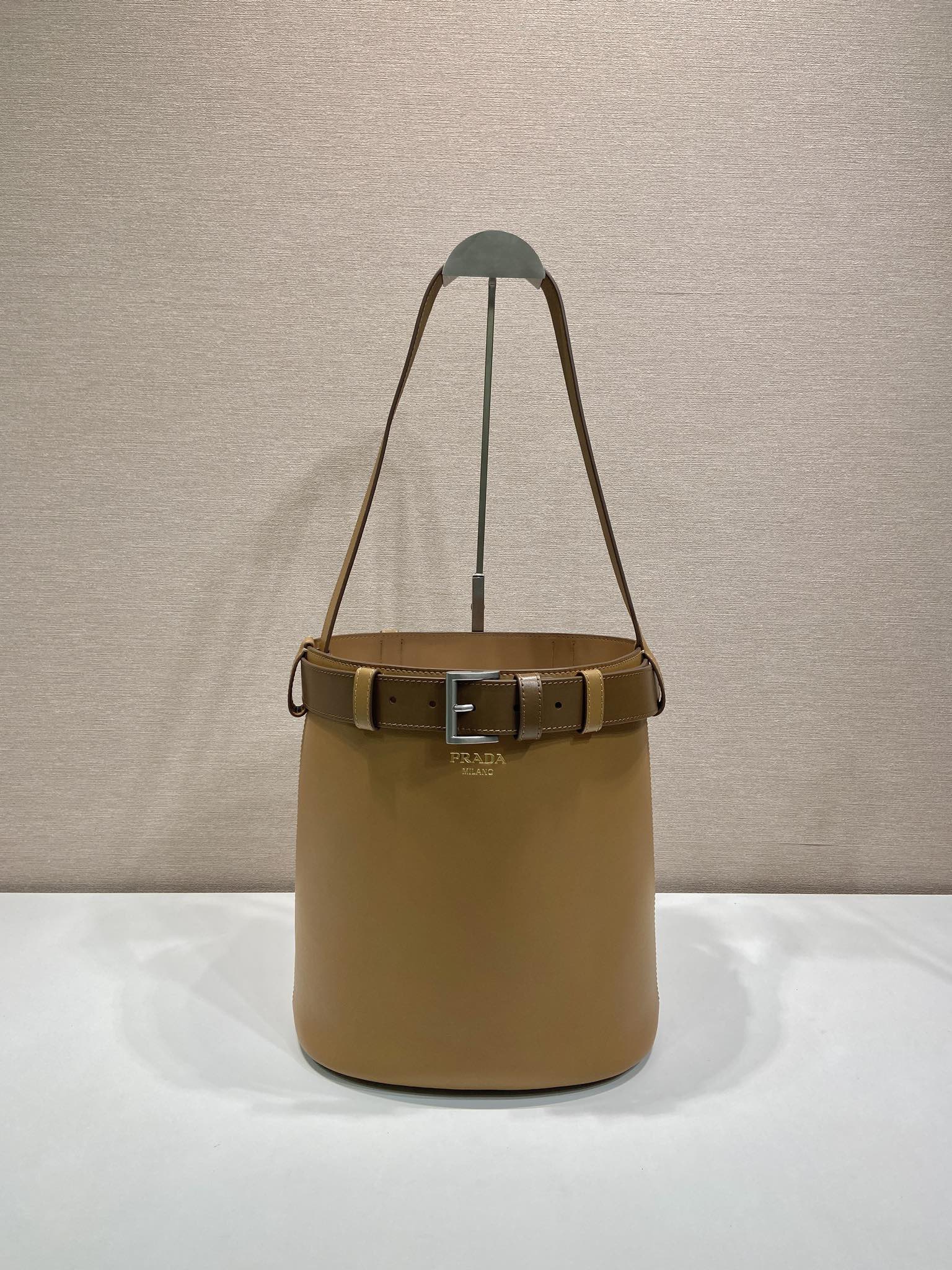 Bagsaaa Pra*a Buckle leather bucket bag with belt 1BE085 brown - 29cm