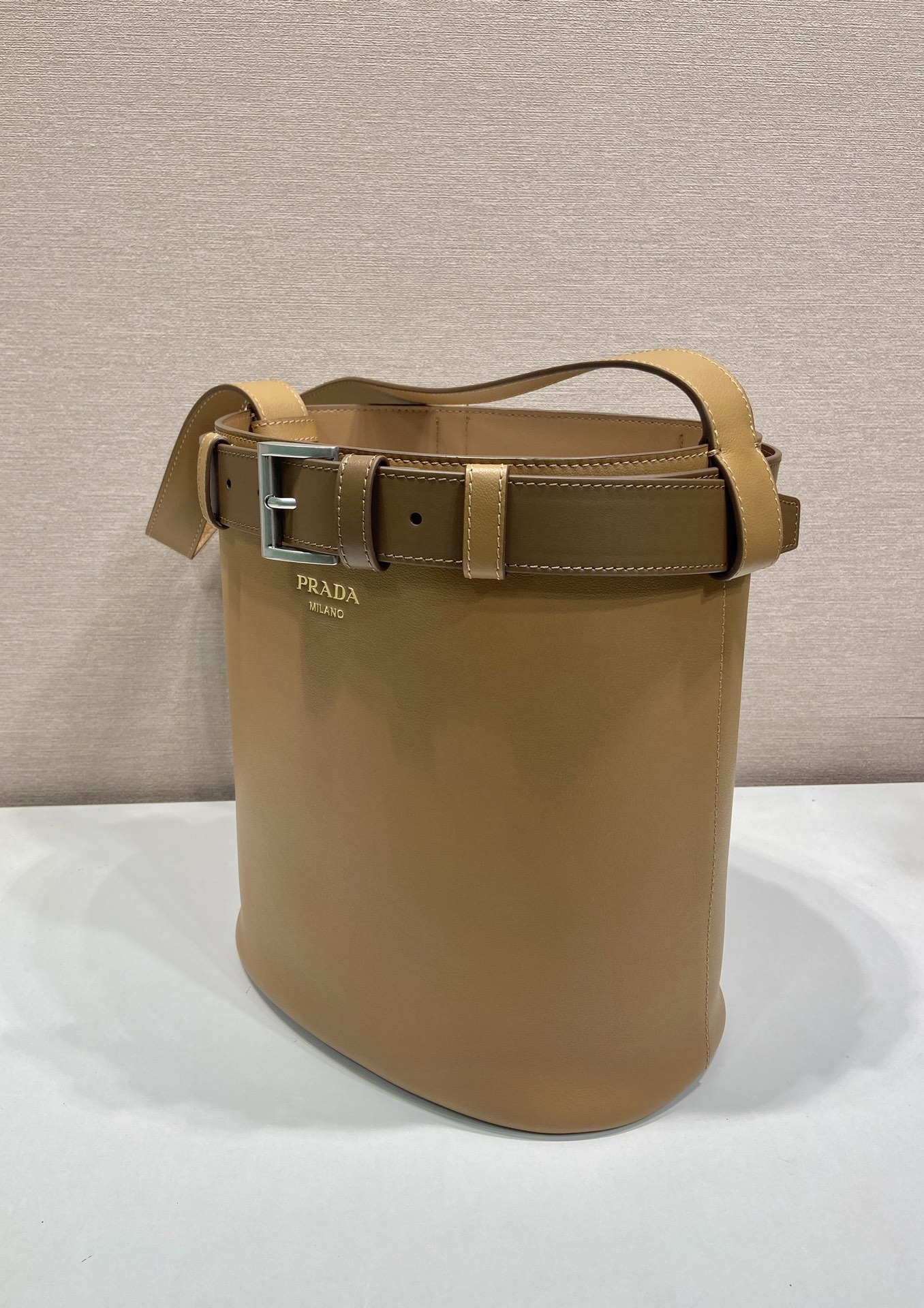 Bagsaaa Pra*a Buckle leather bucket bag with belt 1BE085 brown - 29cm