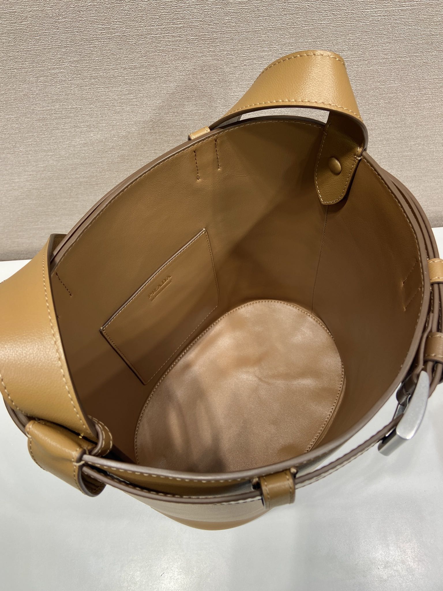 Bagsaaa Pra*a Buckle leather bucket bag with belt 1BE085 brown - 29cm