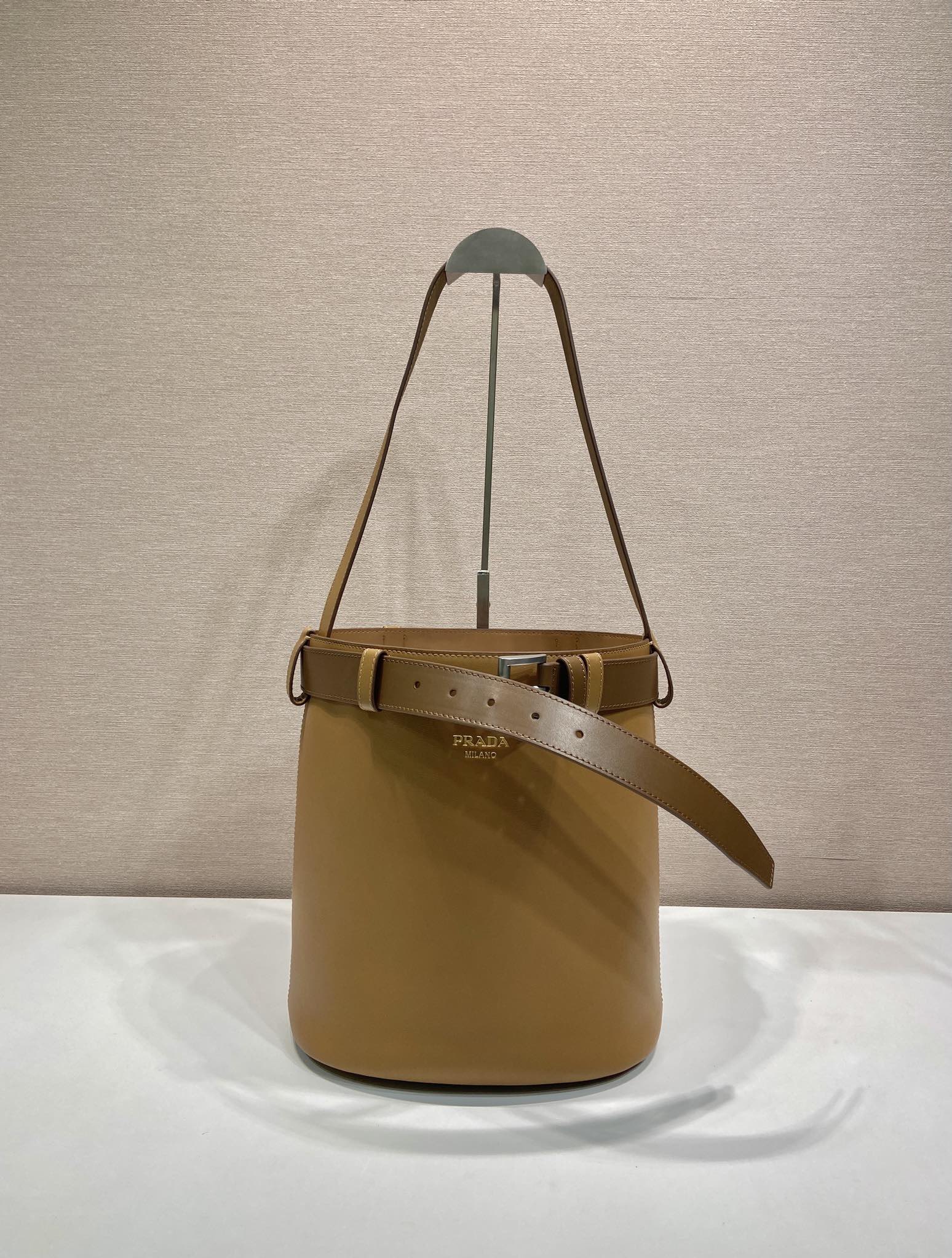 Bagsaaa Pra*a Buckle leather bucket bag with belt 1BE085 brown - 29cm