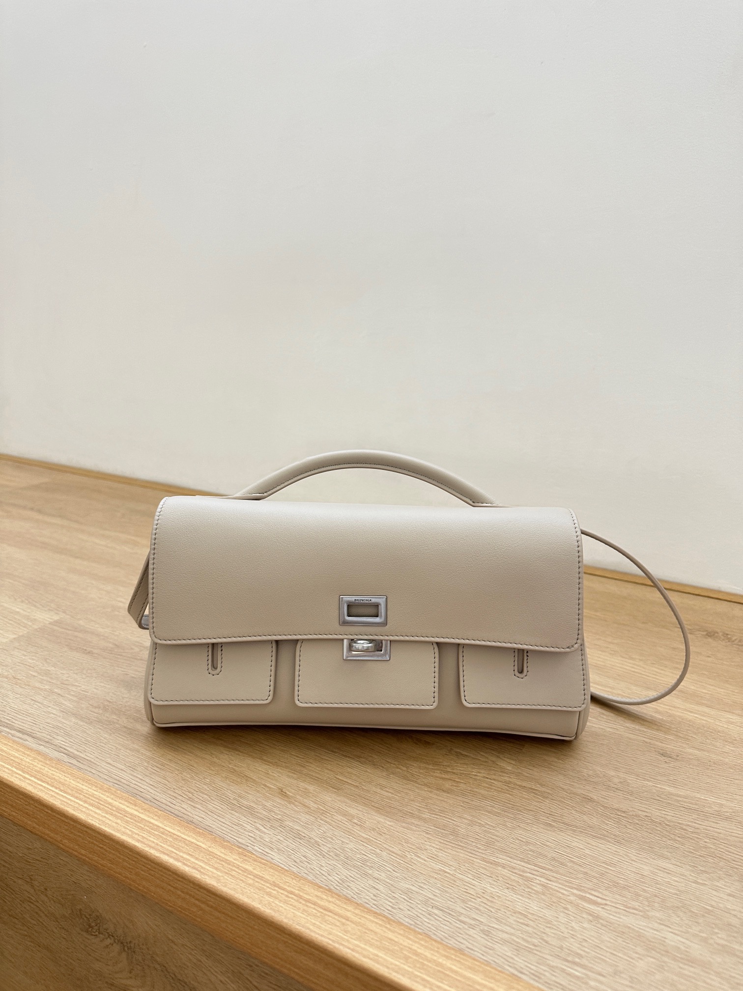 Bagsaaa Ba1en*iaga Bel Air Small Clutch On Strap in almond - 27cm