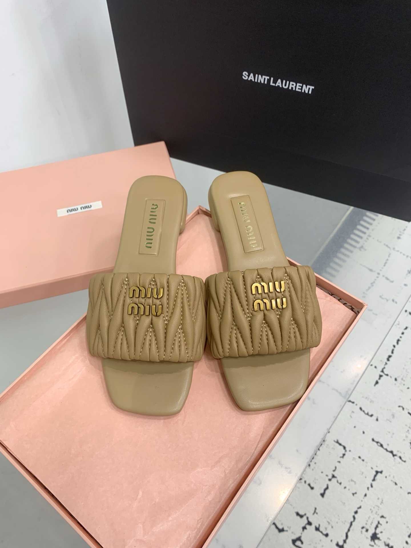 Bagsaaa Miu Miu Matelassé nappa leather slides Caramel