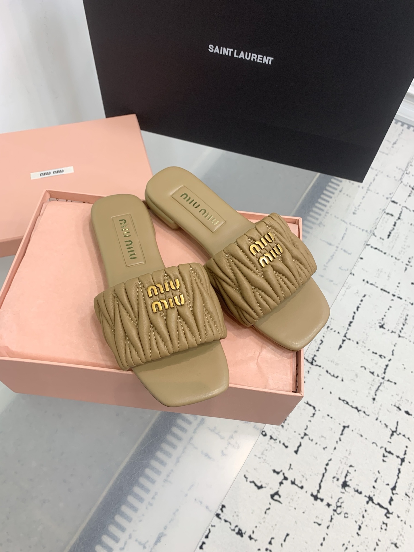 Bagsaaa Miu Miu Matelassé nappa leather slides Caramel
