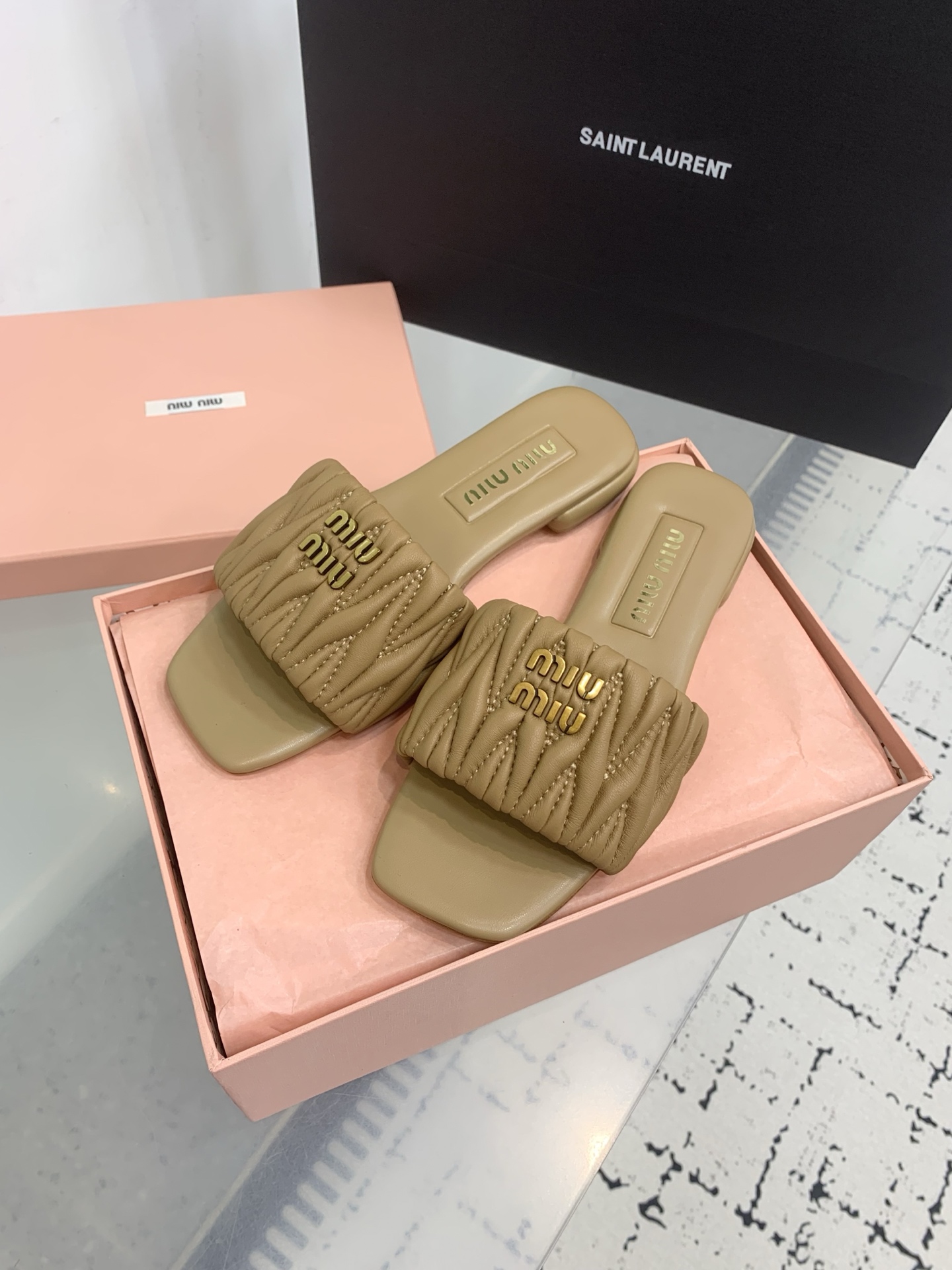Bagsaaa Miu Miu Matelassé nappa leather slides Caramel