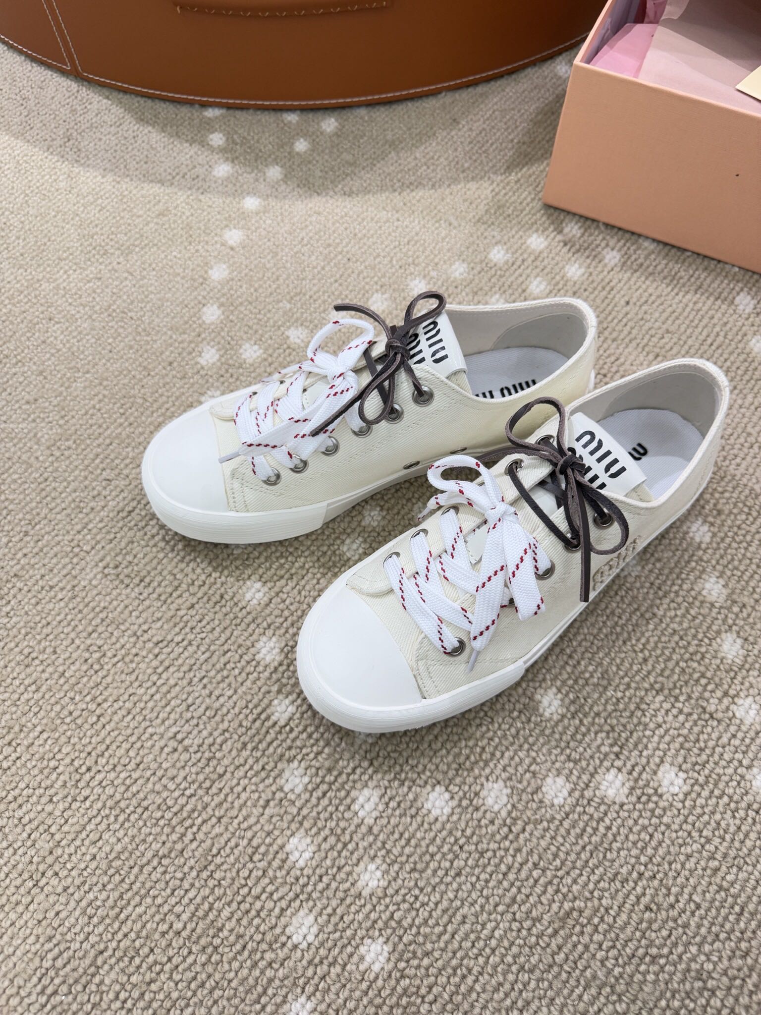 Bagsaaa Miu Miu Washed denim sneakers ivory