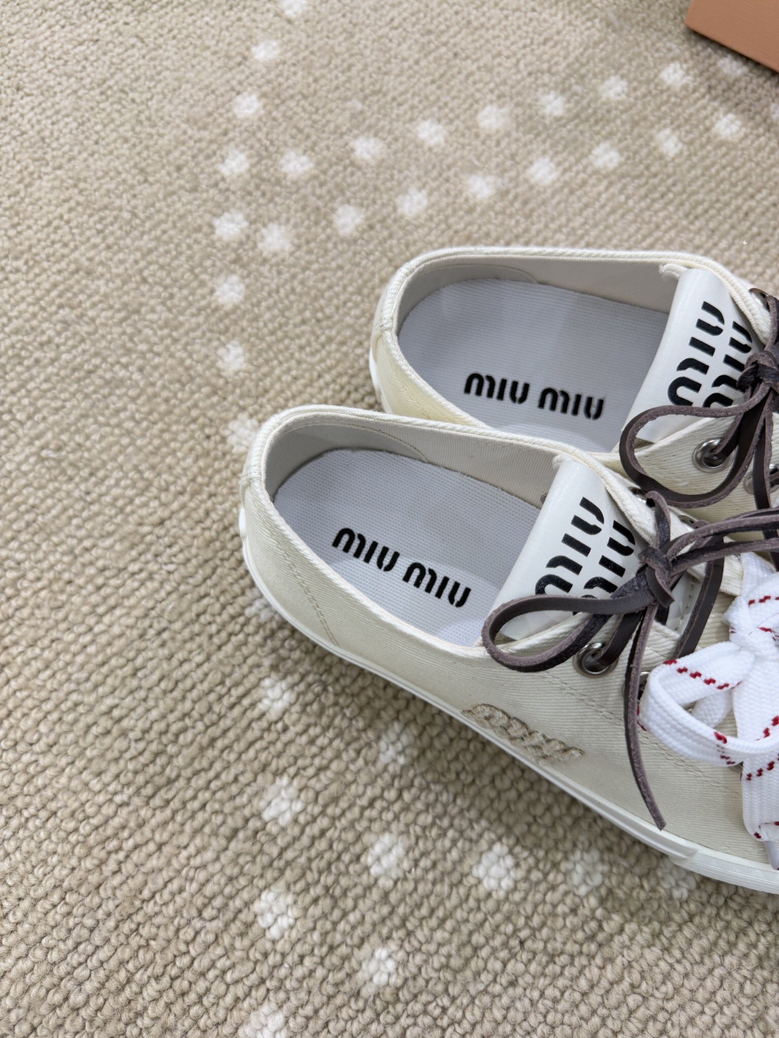 Bagsaaa Miu Miu Washed denim sneakers ivory