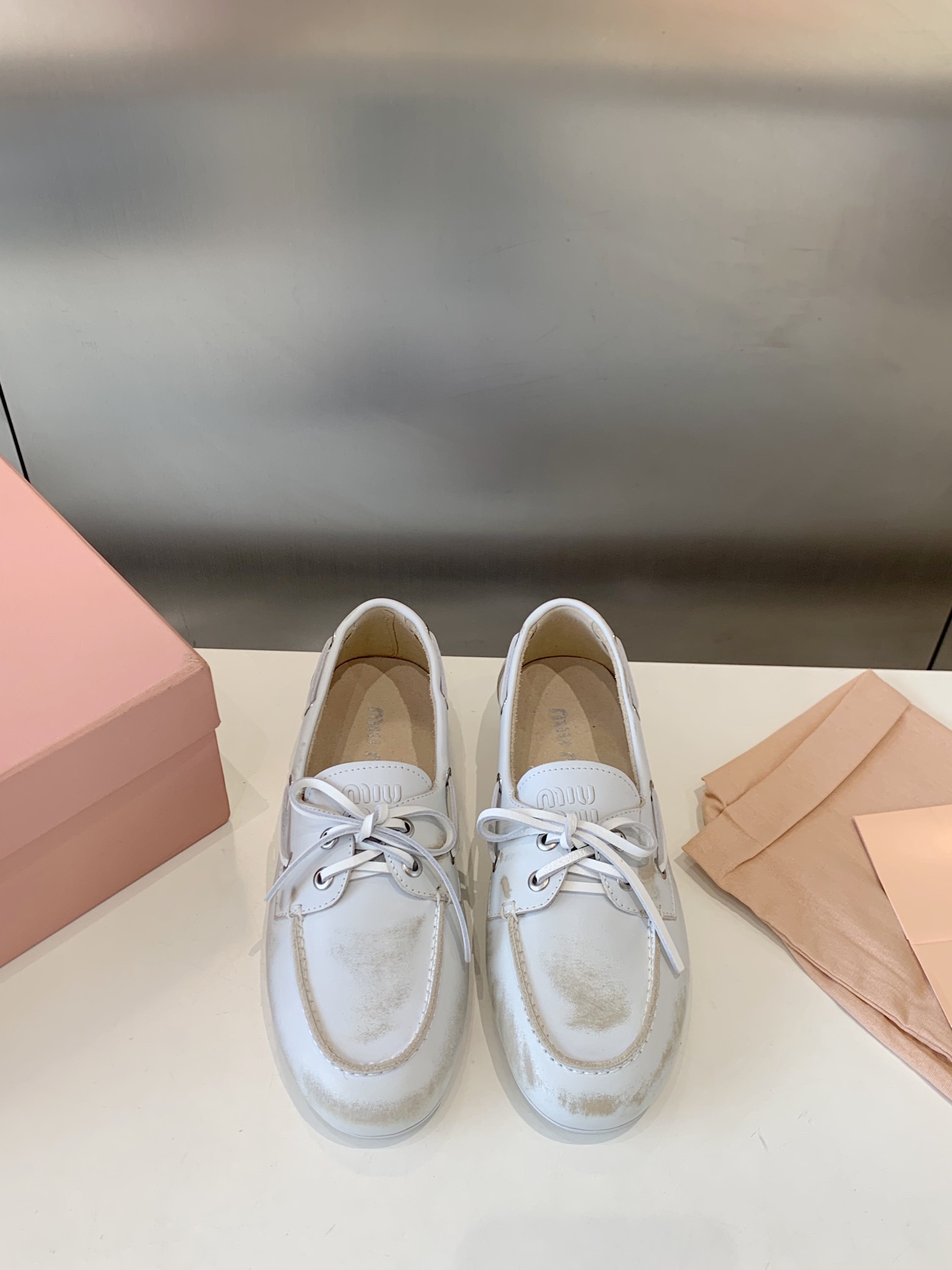 Bagsaaa Miu Miu Unlined bleached leather boat shoes white