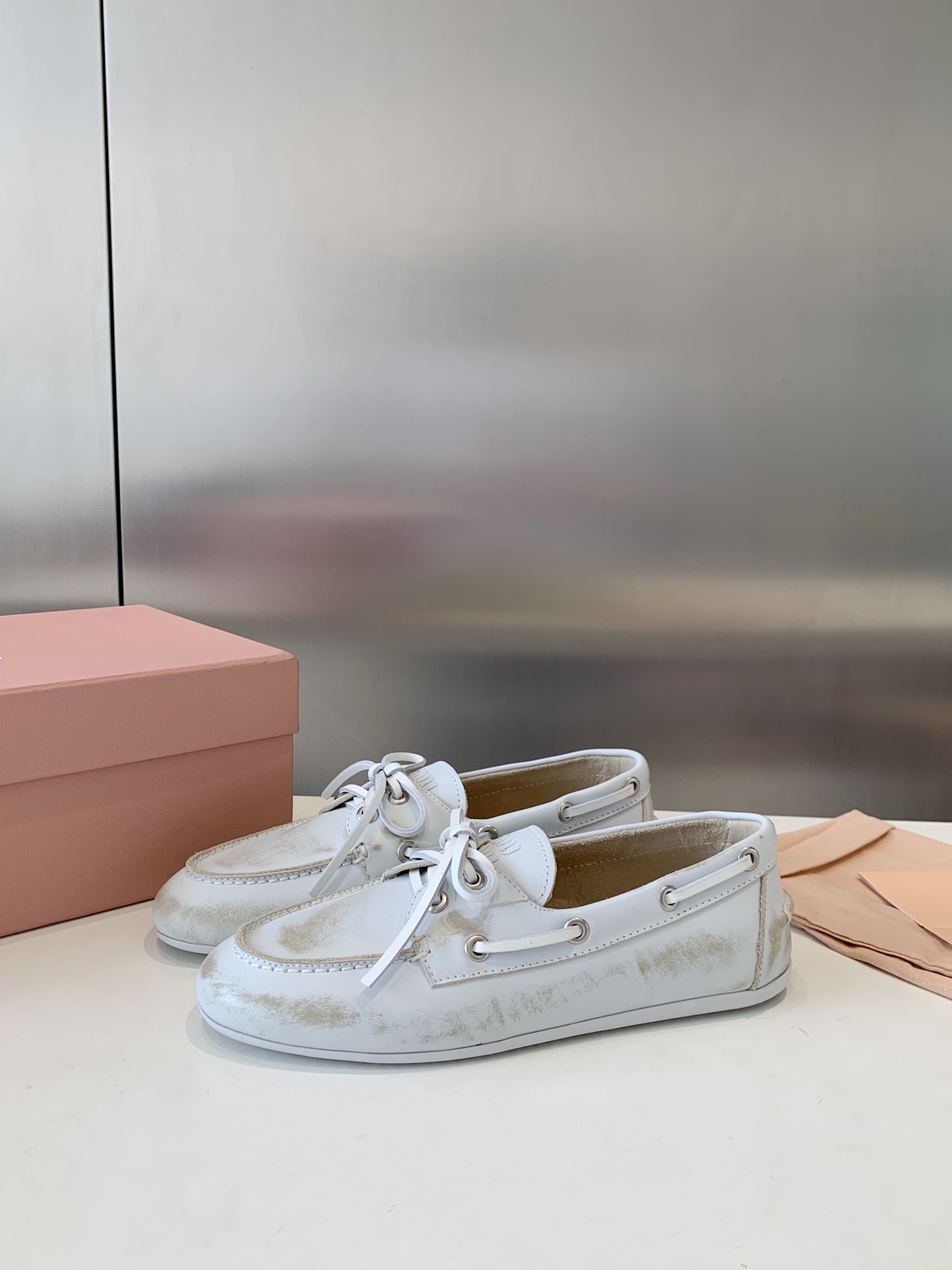 Bagsaaa Miu Miu Unlined bleached leather boat shoes white