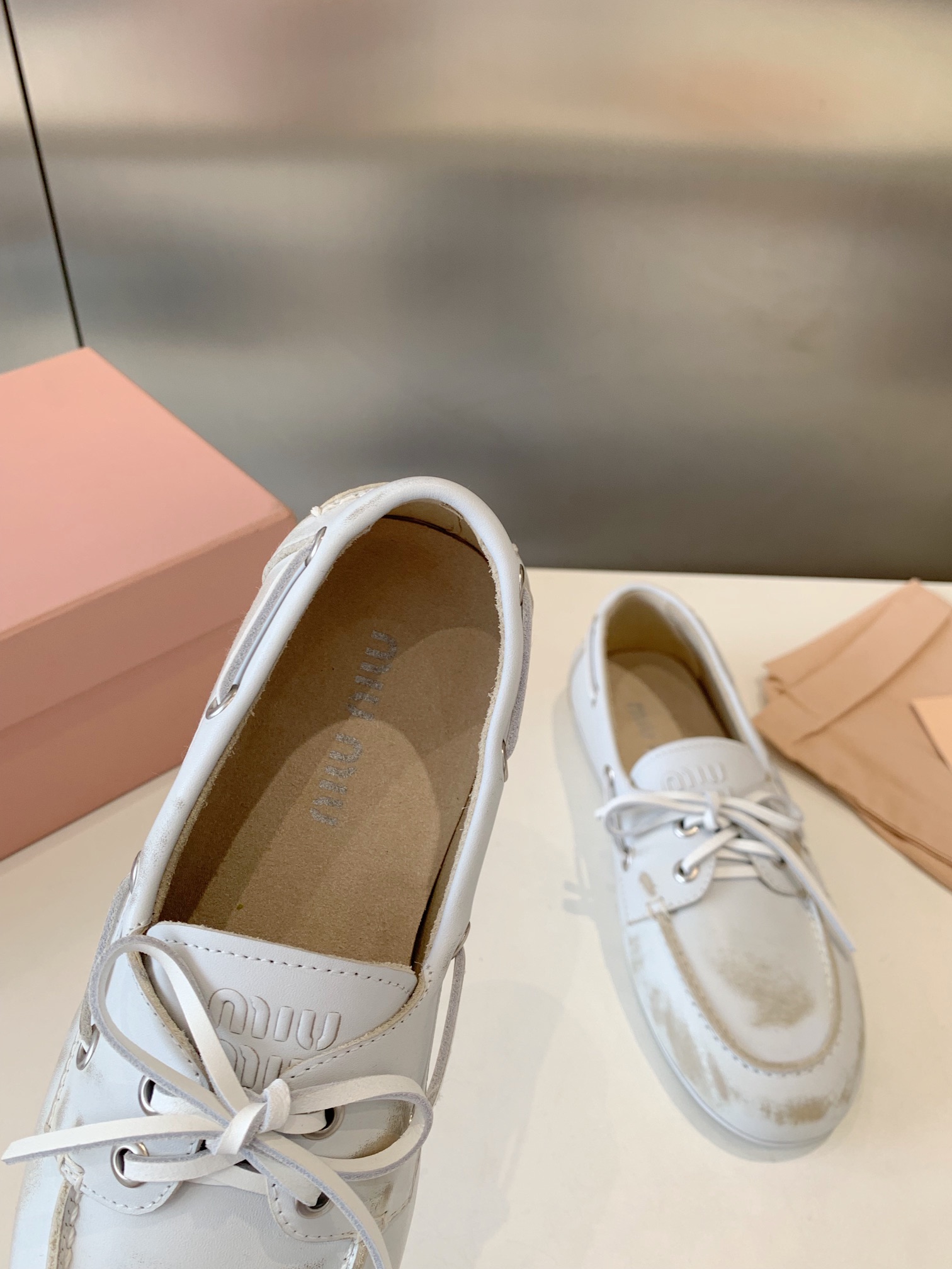Bagsaaa Miu Miu Unlined bleached leather boat shoes white