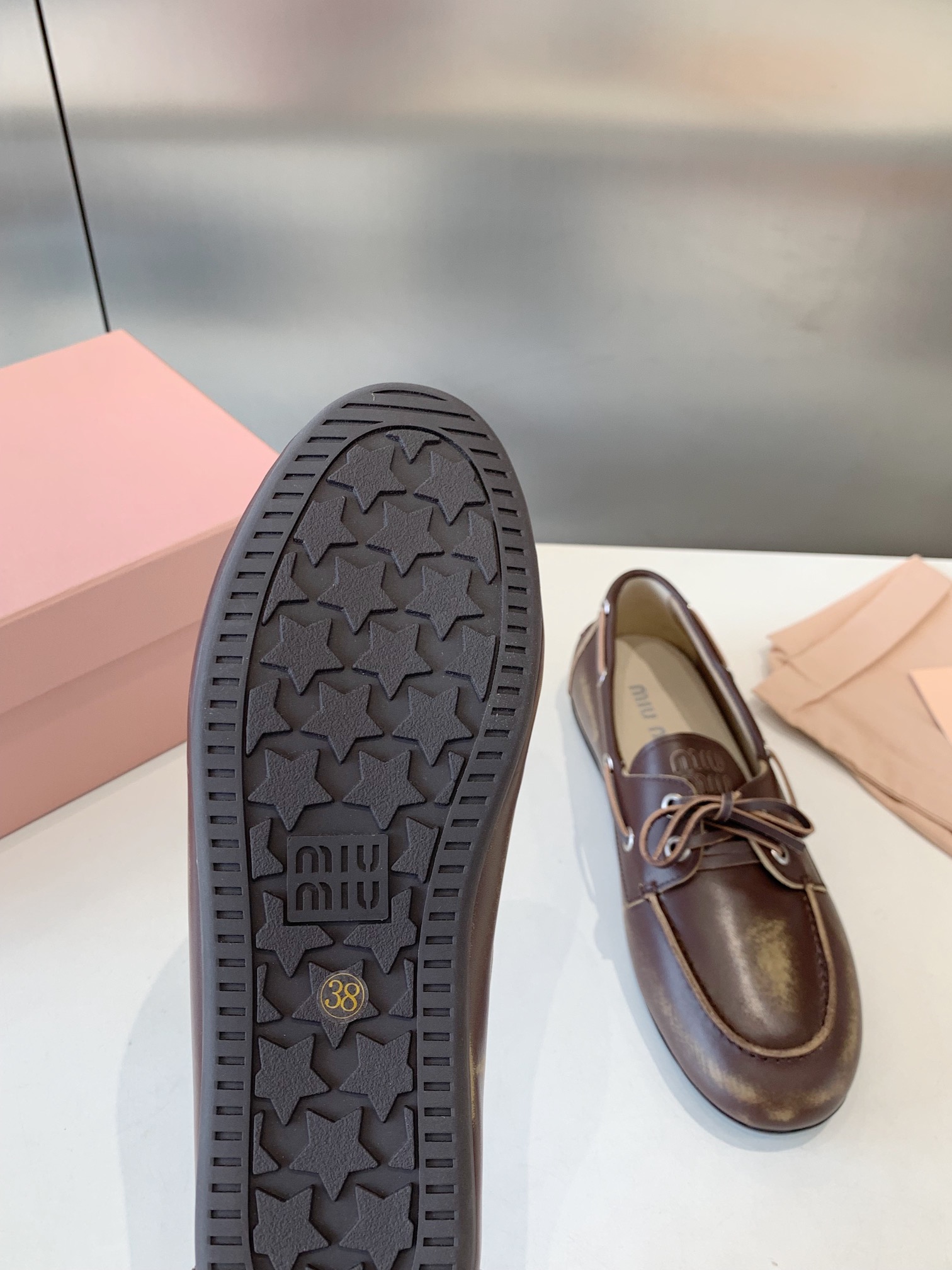 Bagsaaa Miu Miu Unlined bleached leather boat shoes brown